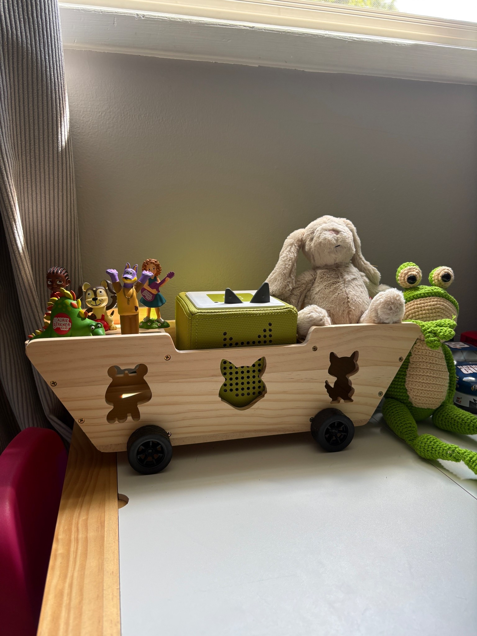 My toddler has been obsessed with his Tonie box even more than usual since getting this ship holder! The top and sides feature magnets to hold the characters! Under the characters on the top, the two sides flip up for more storage! So much room to grow as we get more and more tonies!

#LTKFindsUnder50 #LTKKids #LTKFamily