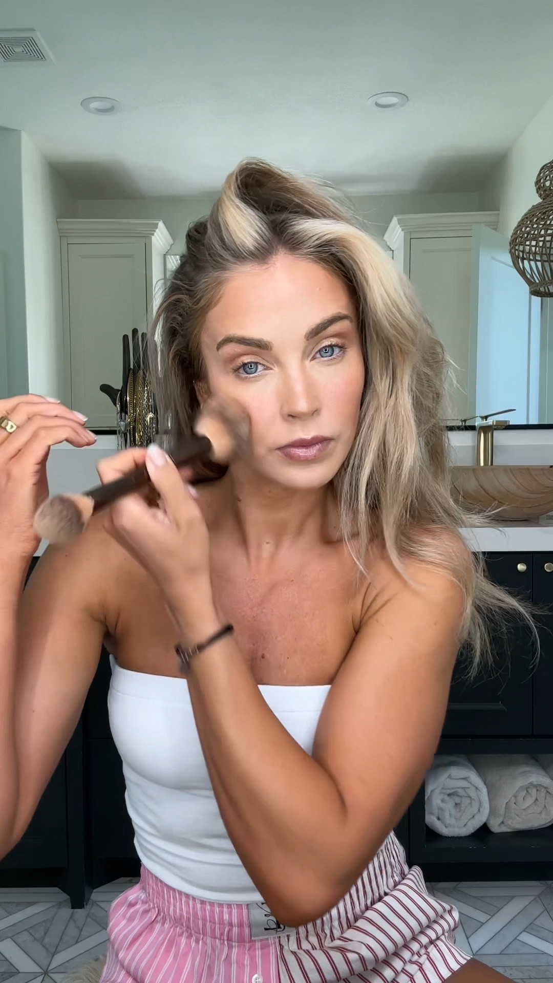 GRWM. Using a ton of new products here I’m in love with!! All color details below…

Tinted moisturizer shade 4
Illuminator shade boost 
Concealer shade sepia 
Blush shade fleur 
Gloss soft mauve 
Bronzer shade Ray

Top xs
Shorts small 

#LTKBeauty