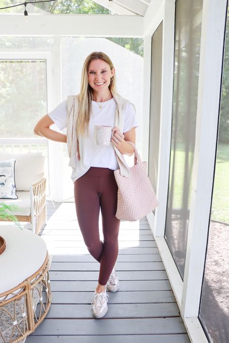 Casual outfit for fall // athleisure // chocolate brown leggings // basic white tshirt // pink tote bag // tretorn sneakers

#LTKitbag #LTKfindsunder50 #LTKstyletip