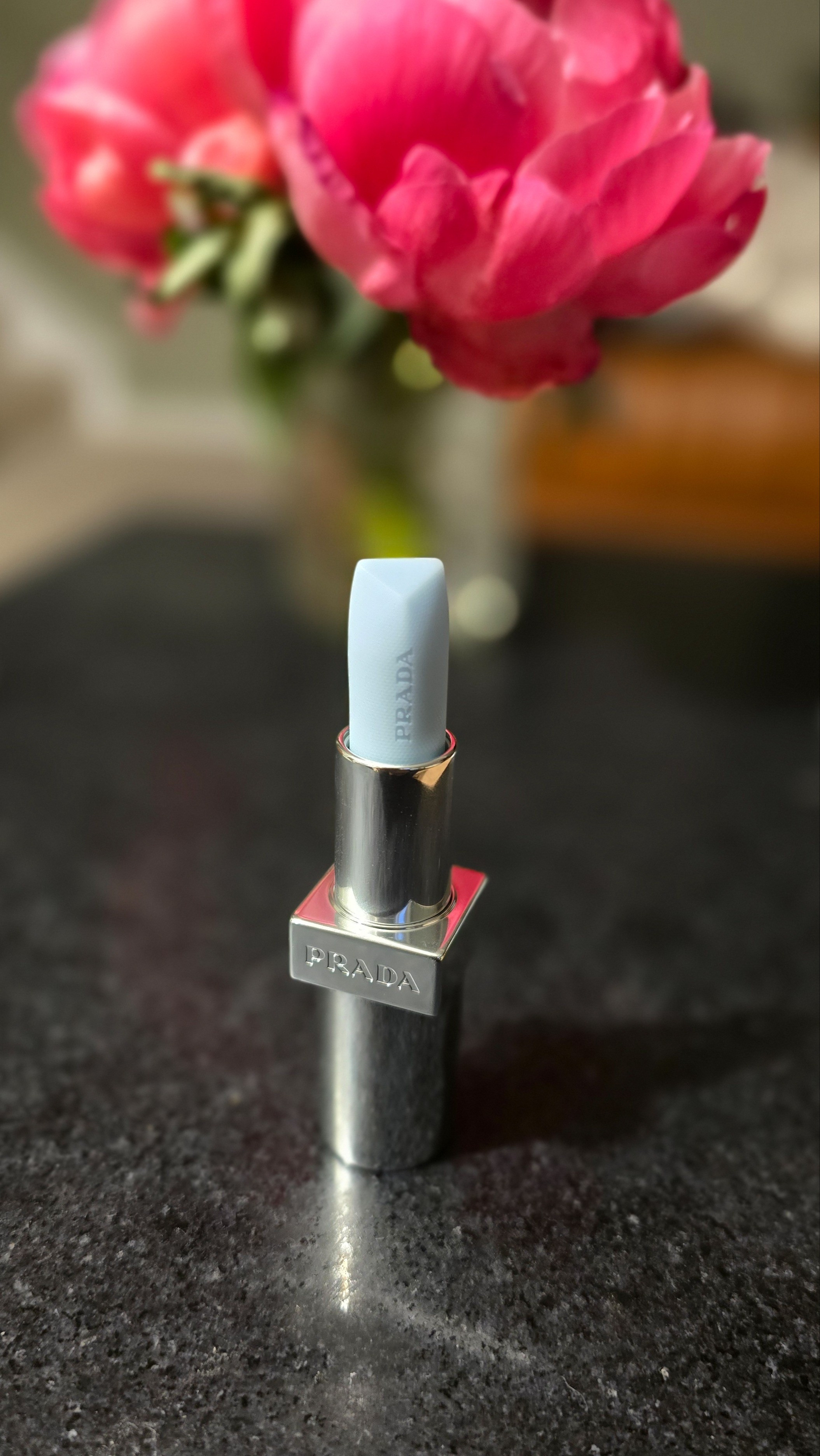 new color of the prada lip balm 🩷 this is their ph-reactive astral pink that adds a natural pink tint once applied

#LTKBeauty #LTKStyleTip #LTKFindsUnder100