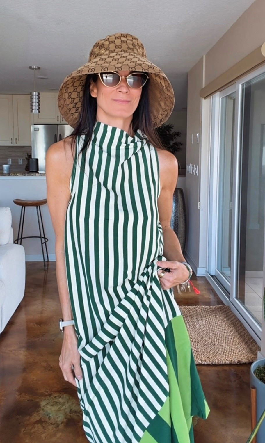 Feeling a little EXTRA lucky in this one 🍀💃🏻

This dress is giving effortless, flowy, and just the right amount of “where are you going looking like that?” energy... and honestly, I don’t have an answer other than wherever there’s sunshine and a cocktail 😏

The stripes, the movement, the whole vibe - she’s easy, she’s chic, and she does all the work for you (which is exactly the kind of energy I’m bringing into this week).

Paired it with my favorite sunnies + Chanel sandals + this hat moment and suddenly I’m booked, busy, and not answering emails✨🍸

Wearing XS

#NicoleColeeStyle #StPatricksDayStyle
#ResortWear #EffortlessChic #VacationVibes

#LTKootd #LTKgrwm #LTKdayinmylife