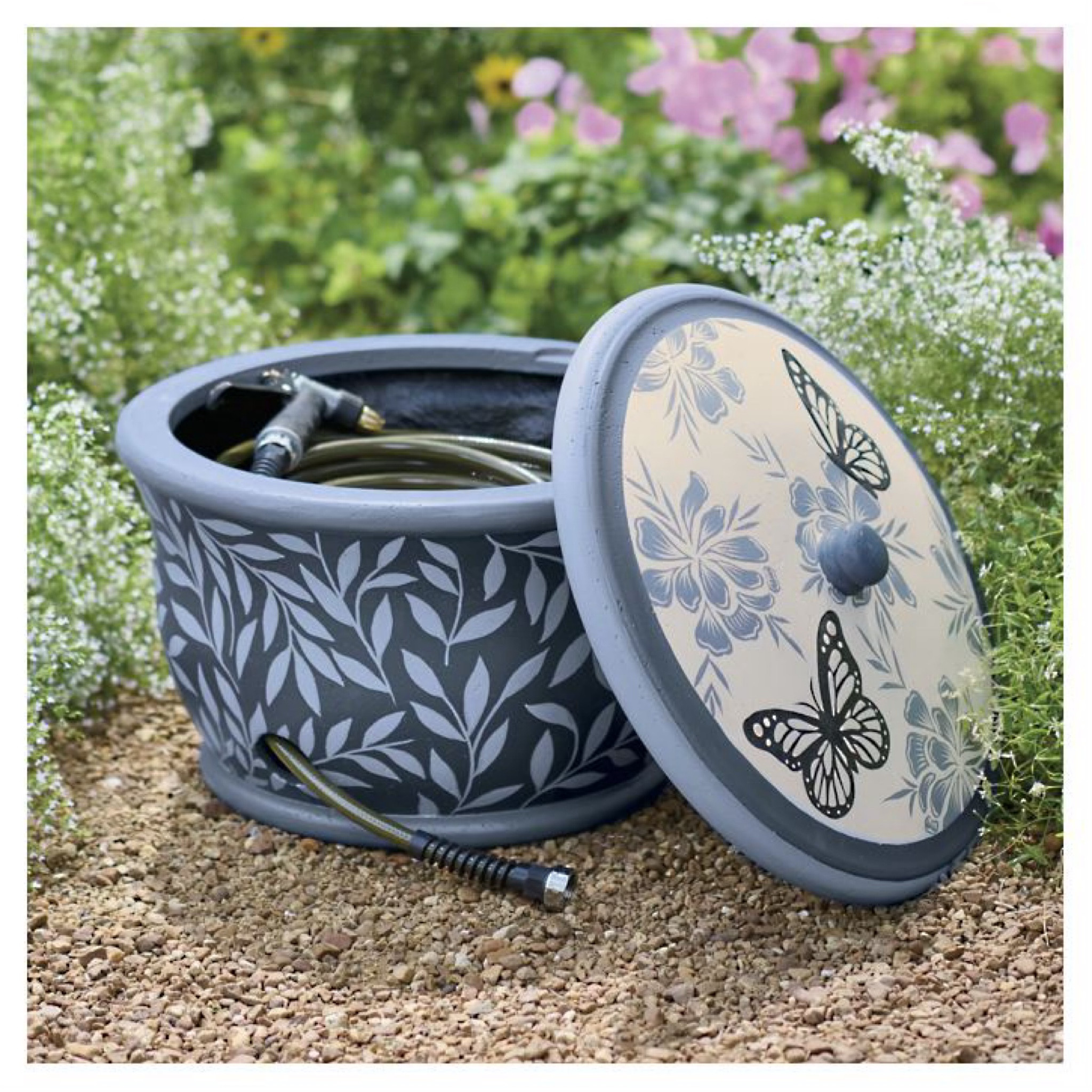 Butterfly Garden Hose Pot This hose pot has been crafted from a weather-durable composite, ready for seasons of outdoor use, and hand-painted in cool and moody blues. This hose pot is a convenient way to keep your hose tidy, close at hand, and out of the elements that work to erode its integrity.

#LTKOver40 #LTKHome