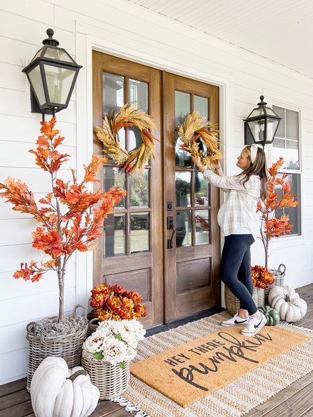 Front porch and door decor fall autumn harvest seasonal entry French double doors oversized layered scatter rug and doormat pumpkin magnolia trees faux artificial silk florals mums baskets wreaths outdoor lanterns wall sconces rocking chairs light fixtures southern modern farmhouse style home decor nearly natural amazon finds Etsy wayfair marshalls TJ Maxx home goods Walmart autumn oak trees flannel button down long sleeve Nike court legacy sneakers fall outfits maternity

#LTKhome #LTKSeasonal #LTKHalloween