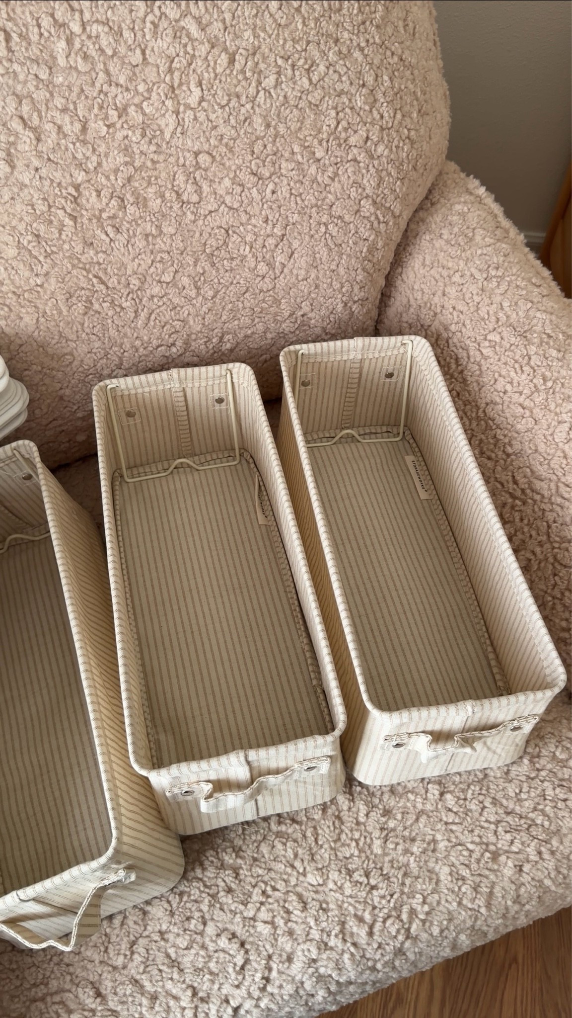 Nursery organization 👌🏼 Striped baskets and large one both are collapsible, hangers are perfect size for baby. Loving these baskets for diapers, wipes + books! 
#nursery #organization #bresheppard #basket #babyprep #nesting

#LTKBaby #LTKBump