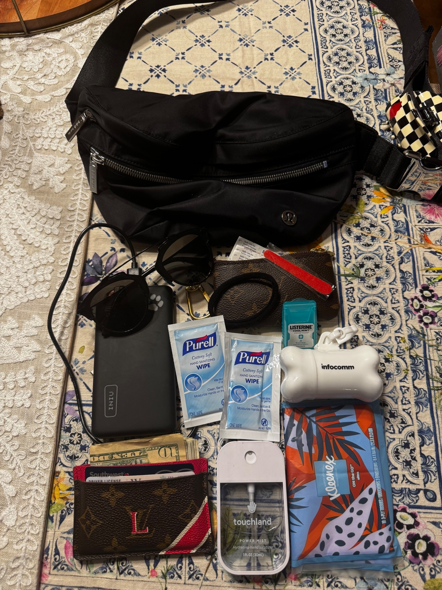 When we go to the racetrack, I prefer to carry a belt bag with me with the essentials (the fancy purses stay at home!) some of my must-haves: sanitizer spray and wipes,  power bank, hair tie and breath fresheners, Kleenex, wallet, poop bags, and sunglasses. 

#LTKTravel #LTKFindsUnder50 #LTKStyleTip