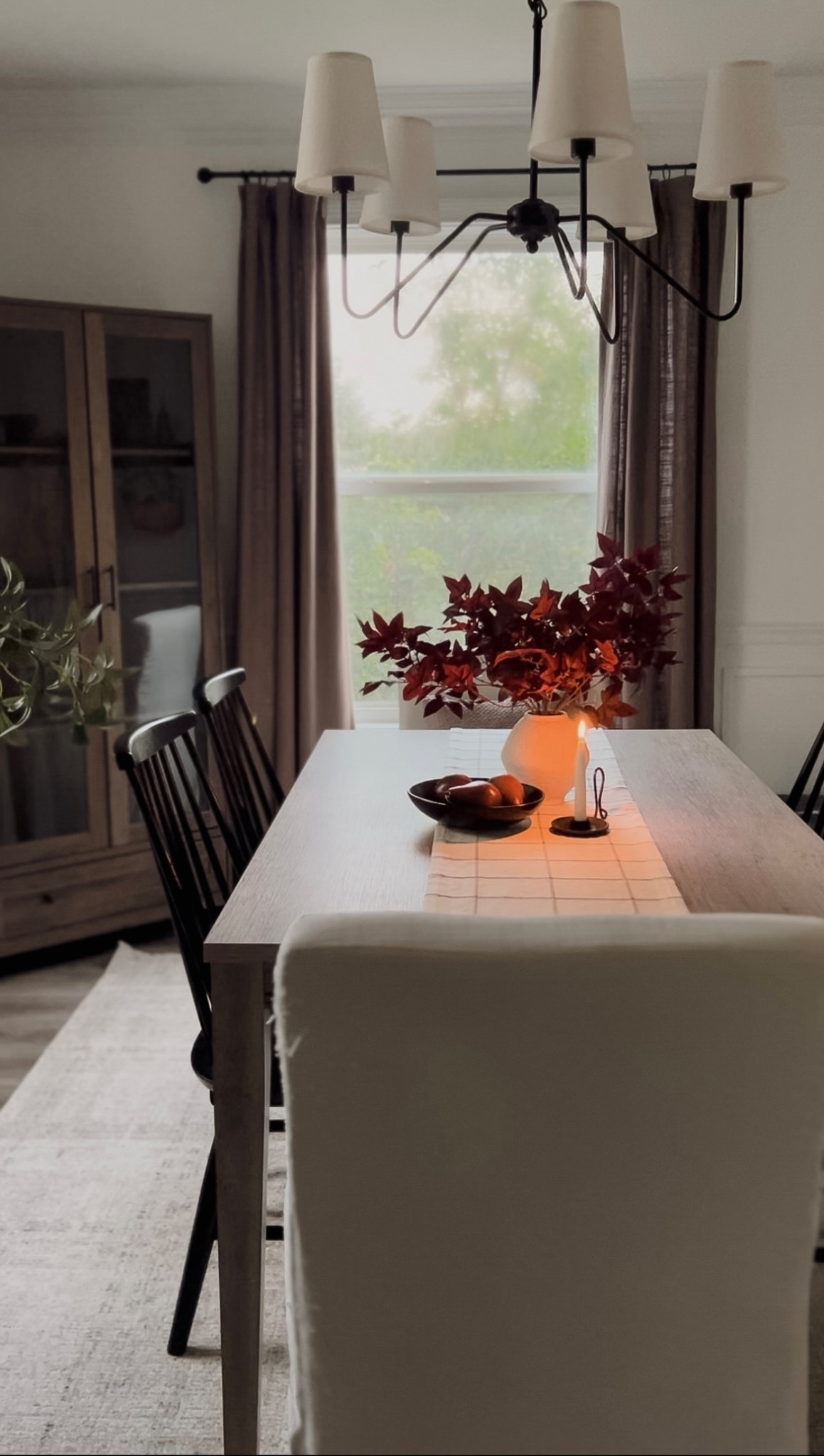 Target decor, fall decor, dining room decor, fall stems, fall florals, black dining chairs, white dining chairs, dining room curtains, dark brown curtains, chocolate curtains, dining room cabinet, curio cabinet, white area rug, dining room area rug, wooden dining table

#LTKSeasonal #LTKSaleAlert #LTKHome