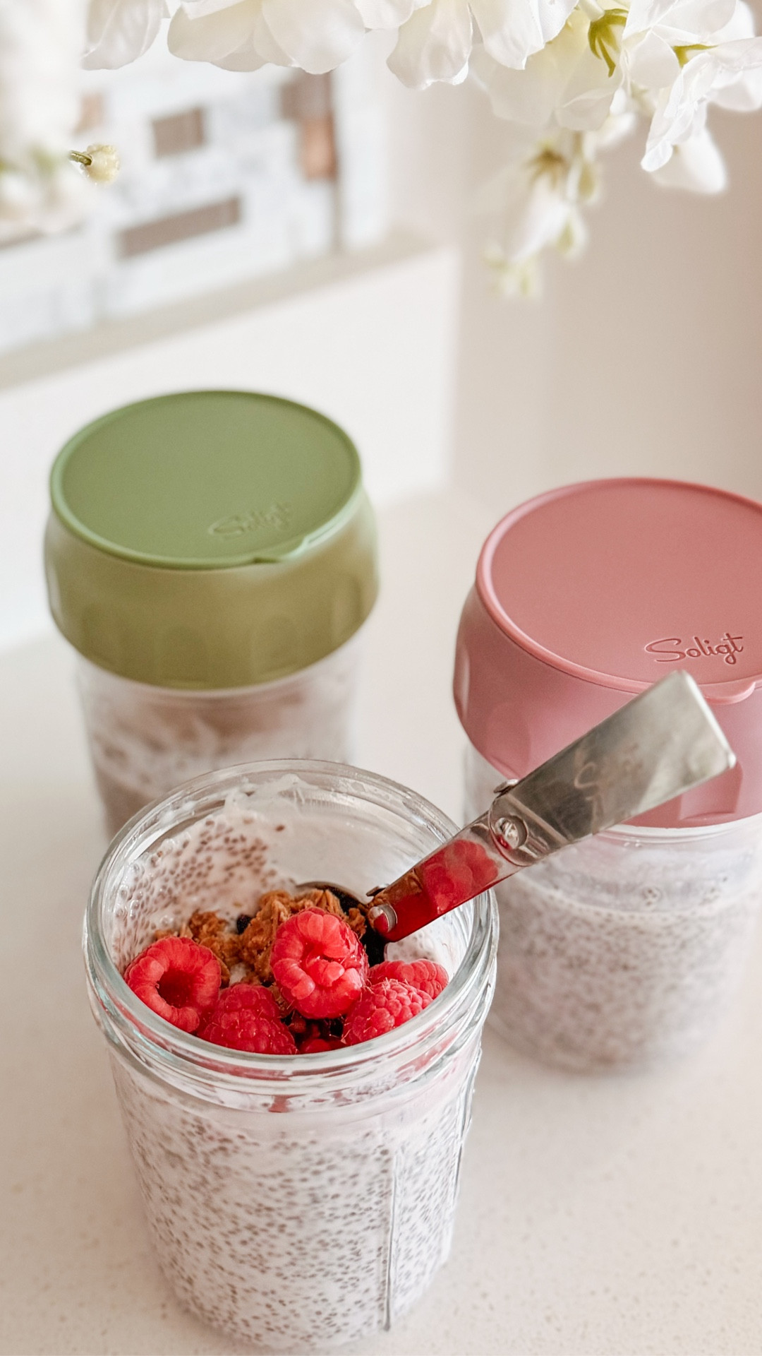 I’ve been making these on repeat lately because they take 5 minutes to throw together and actually hold up in the fridge.

Crushed raspberries + strawberry Greek yogurt + chia seeds + a little maple syrup + splash of almond milk. Mix, chill, done.

Top with fresh berries and granola when you’re ready and it feels way more put together than the effort it takes.

Perfect for mornings when you don’t want to think or quick grab and go snacks.

And yes, the jars have a separate top for toppings and a collapsible spoon which makes them way too easy to take with you.


#LTKHome #LTKfoodie #LTKdayinmylife