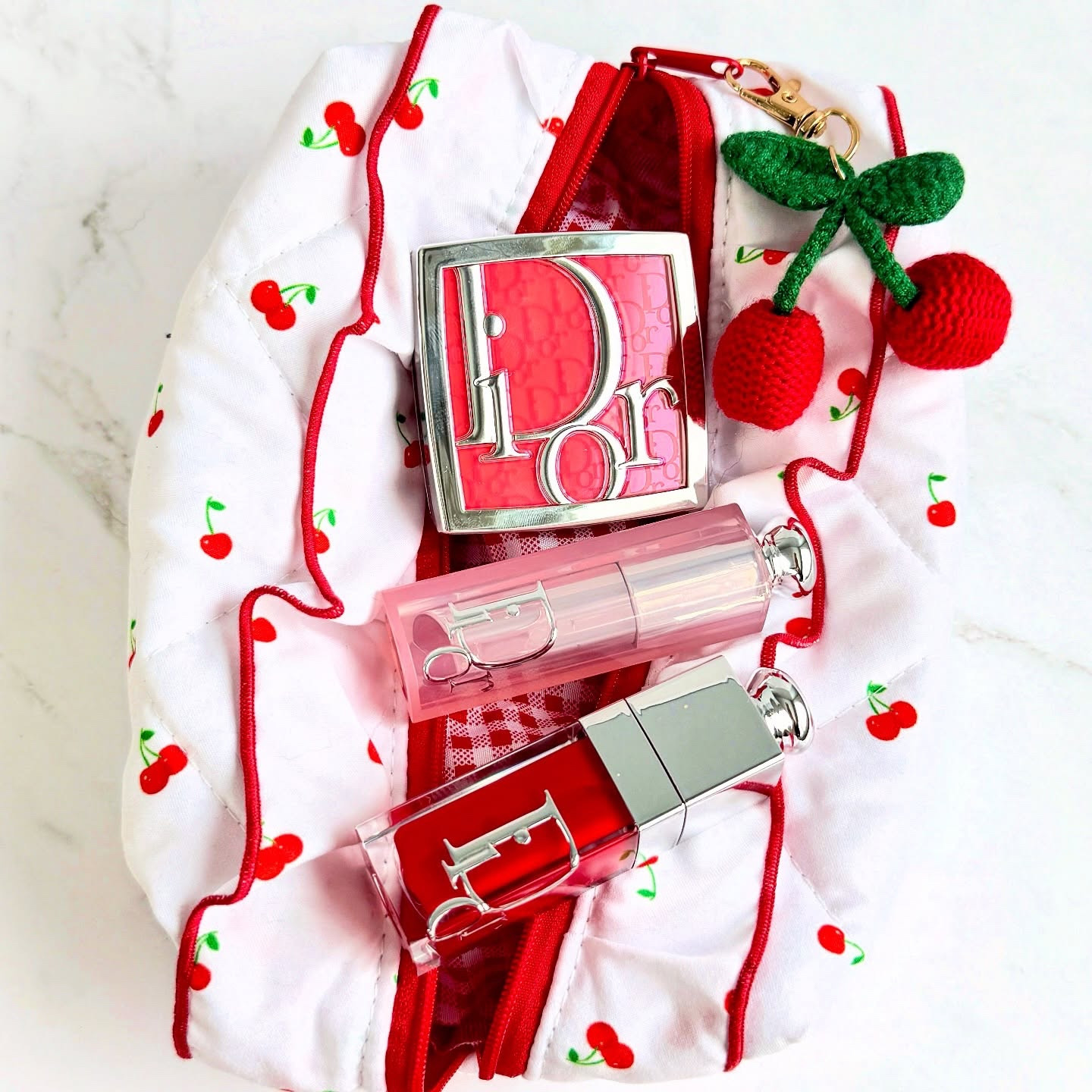 Cherry-picked by Dior 🍒

A juicy red lip, a cherry glow blush, and the cutest little pouch to match.

Who else is a cherry red addict? 🍒❤️🍒

Backstage Rosy Glow Cherry
Dior Addict Lip Glow Balm Strawberry
Dior Addict Lip Glow Oil Strawberry 

#diorbeauty #diorbeautylovers #diorlips #luxurybeauty #makeupflatlay @diorbeauty @diorbeautylovers
