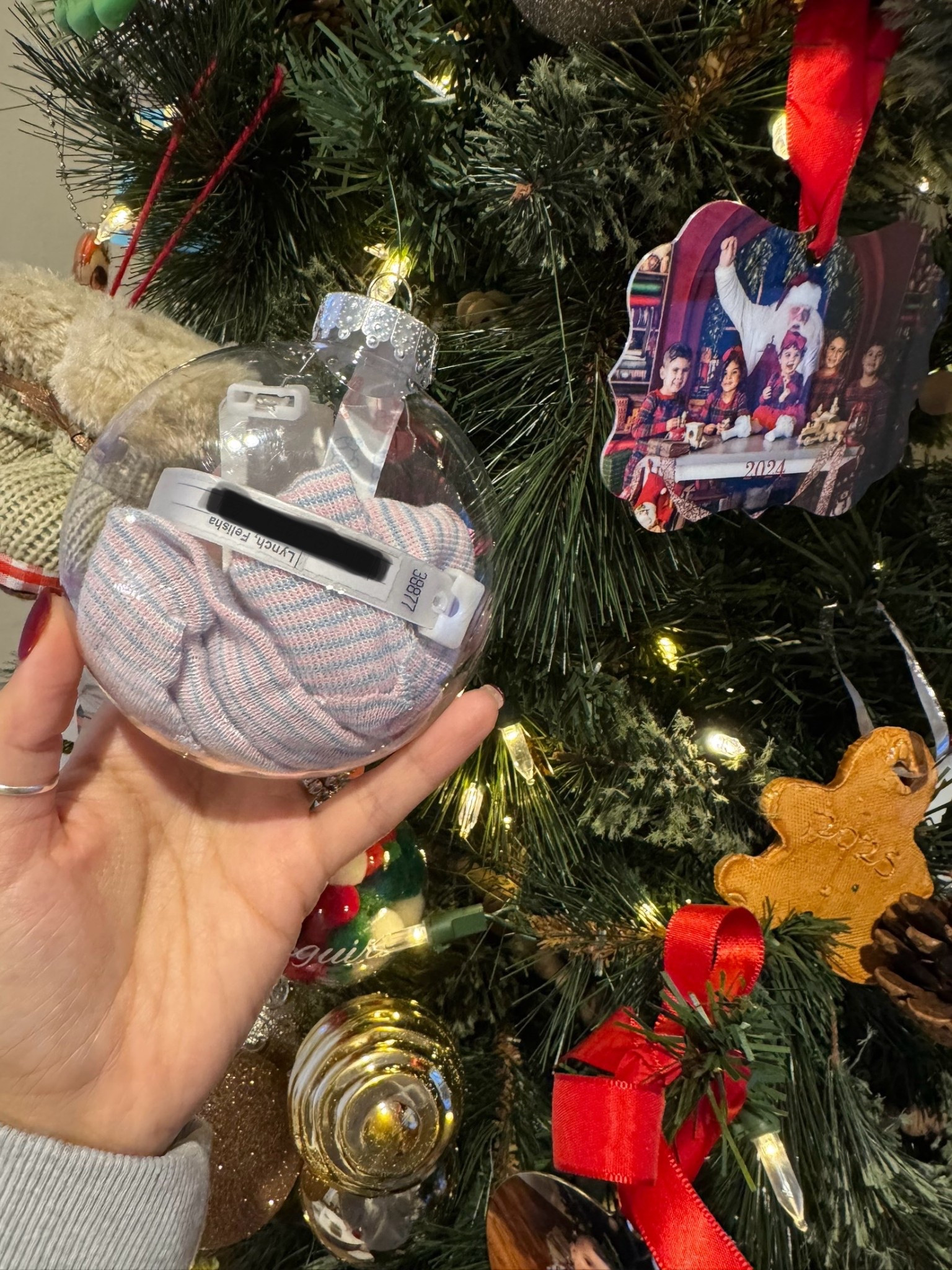 We put all of our baby’s newborn hats and hospital bracelets in these clear fillable ornaments!

#LTKKids #LTKHoliday