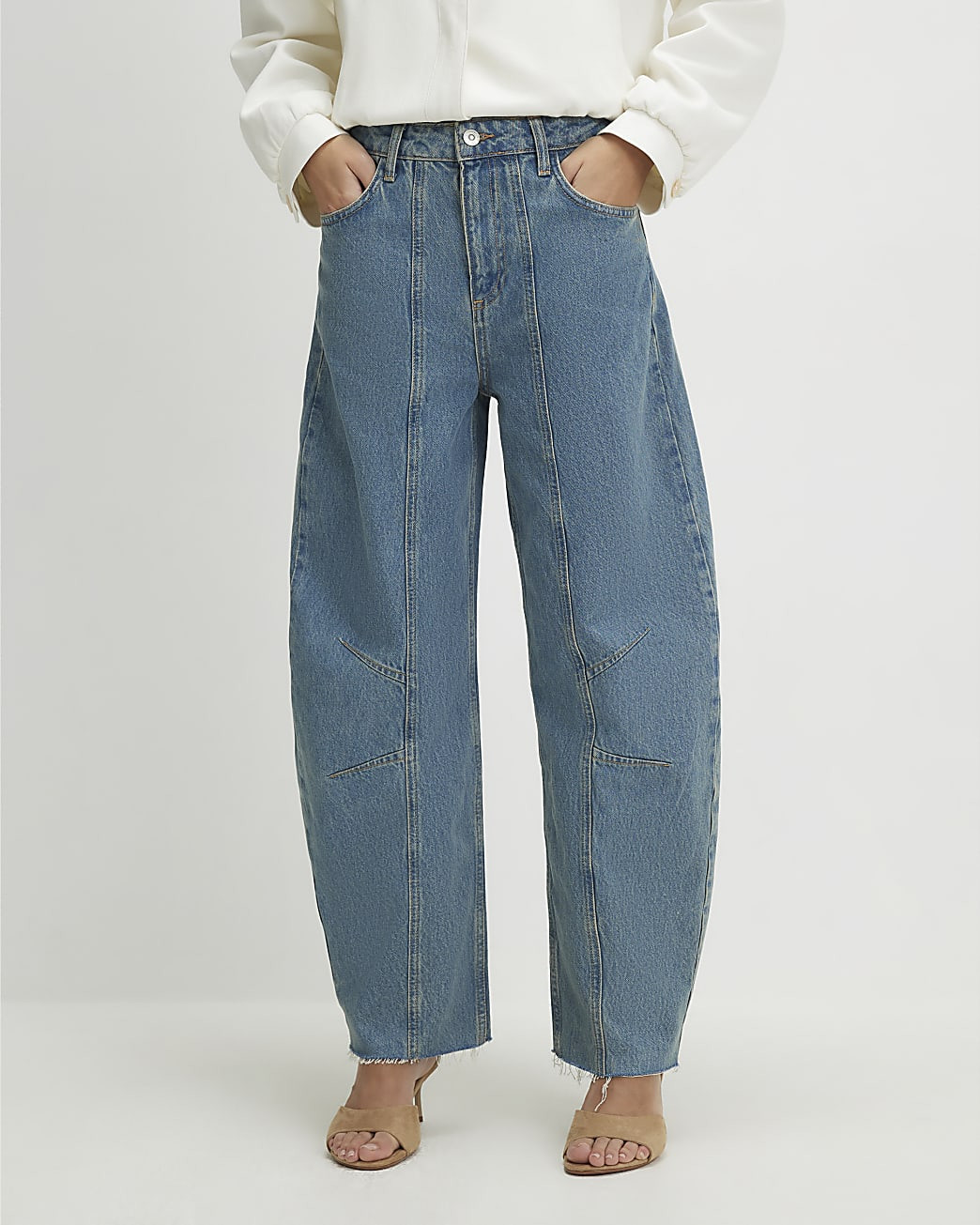 Blue Seamed Raw Hem Barrel Leg Jeans | River Island UK & IE