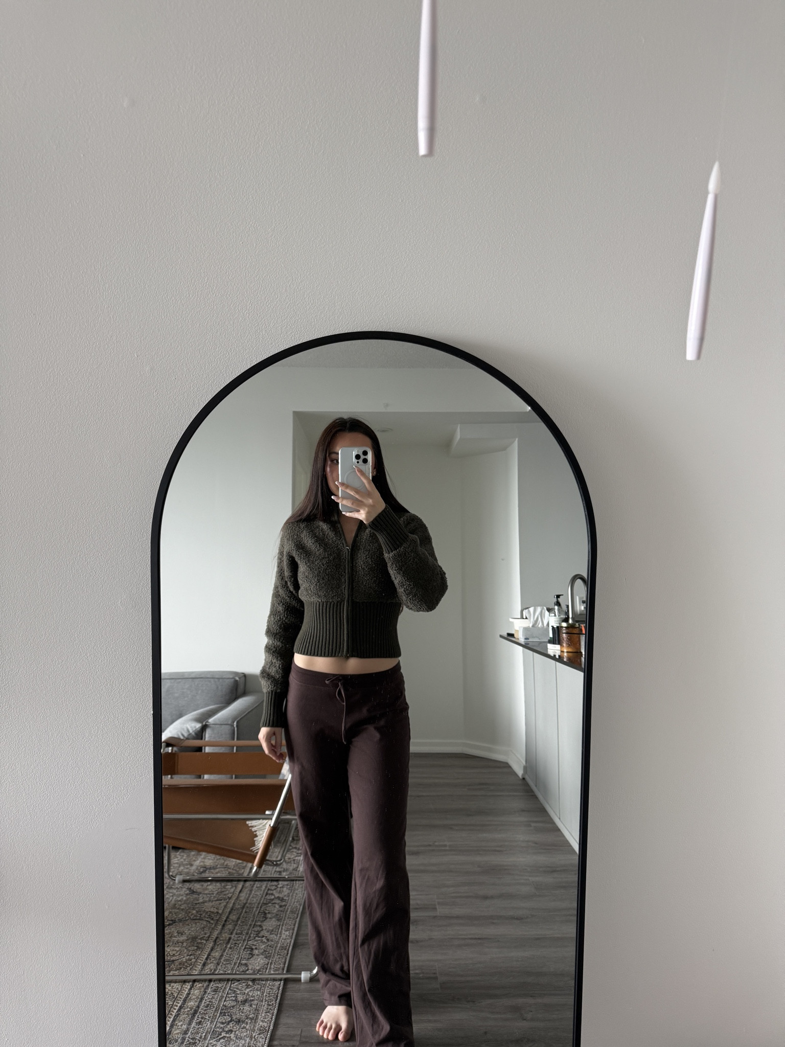 A cozy, easy uniform built from two Aritzia essentials. The Astro Zip brings that plush, teddy-textured warmth with a cropped, ribbed waist that naturally cinches the silhouette. It’s snug, minimal, and made for off-duty days where you still want shape.

The Homestretch Smooth Mid-Rise Pant balances it perfectly — lightweight, drapey, and soft in that signature Smooth fabric that falls effortlessly with every step. The relaxed straight leg and adjustable waist keep it unfussy and comfortable while still feeling elevated.

Together, the textures do all the work: soft fleece against fluid knit, deep tonal browns, and a silhouette that’s relaxed but refined. An indoor-to-anywhere outfit that feels intentional without trying.

#LTKHoliday #LTKootd