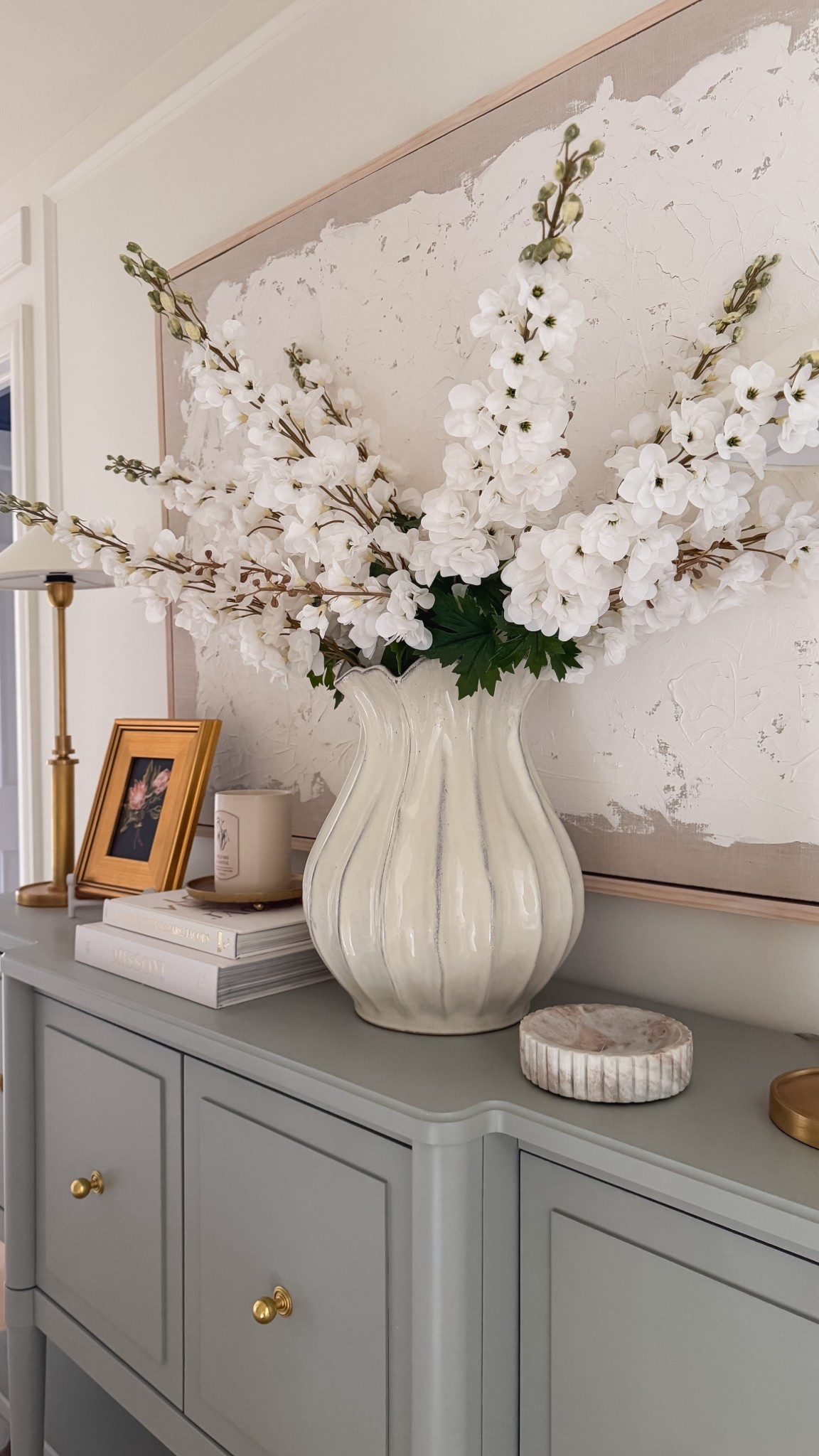This scalloped vase is HUGE and can hold a ton of stems. It really makes a statement and would be perfect for a console table, dining table, coffee table or kitchen island! 

#LTKHome #LTKSeasonal #LTKSaleAlert