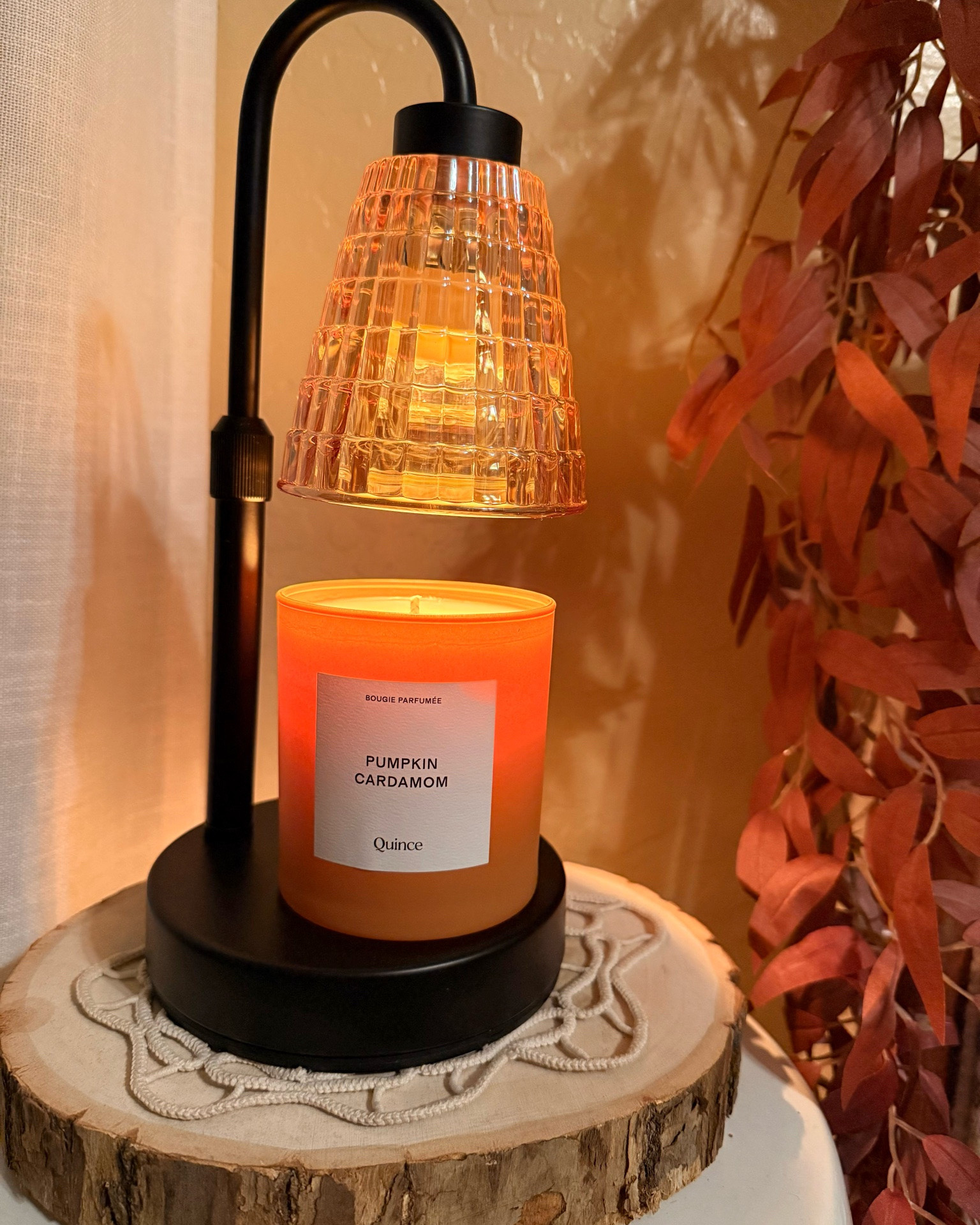 Pumpkin cardamom candle from Quince. It smells amazing. It makes the space feel cozy, with a beautiful strong scent that stays balanced. It comes in a cute box, making it great for gifting. The candle warmer lamp is from Amazon, just $12.99. I love that it comes with a remote control.

#LTKSeasonal #LTKHome #LTKselfcare #LTKSaleAlert