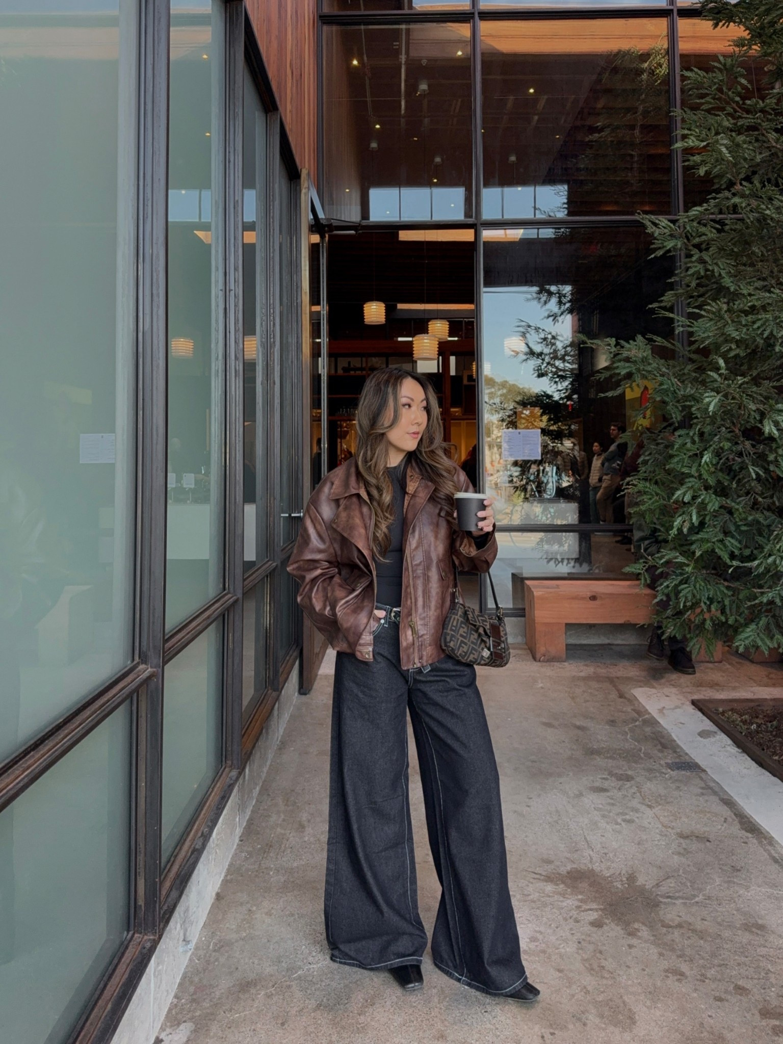 cyber monday sale on entire fit — wearing a size medium in brown leather jacket