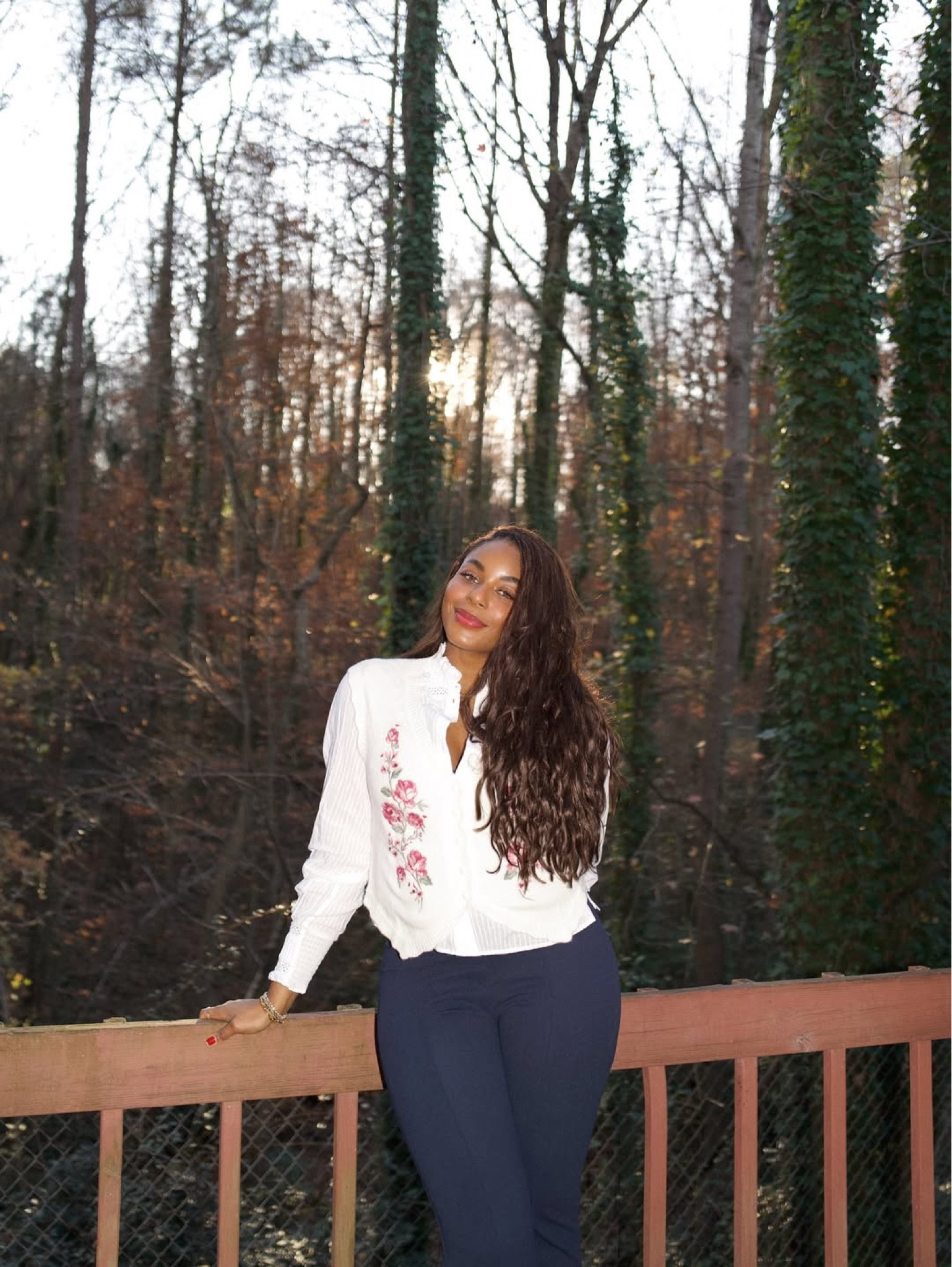 The sweetest little floral embroidered vest is now on sale for cyber Monday! I’m in love with this piece from for love and lemons - it’s a great chic layering style for the winter season and I wore it as part of my holiday outfit! Styled with  ruffle trim button up shirt and navy tailored trousers. Linking this chic winter outfit idea below! 

#LTKootd #LTKHoliday #LTKgrwm