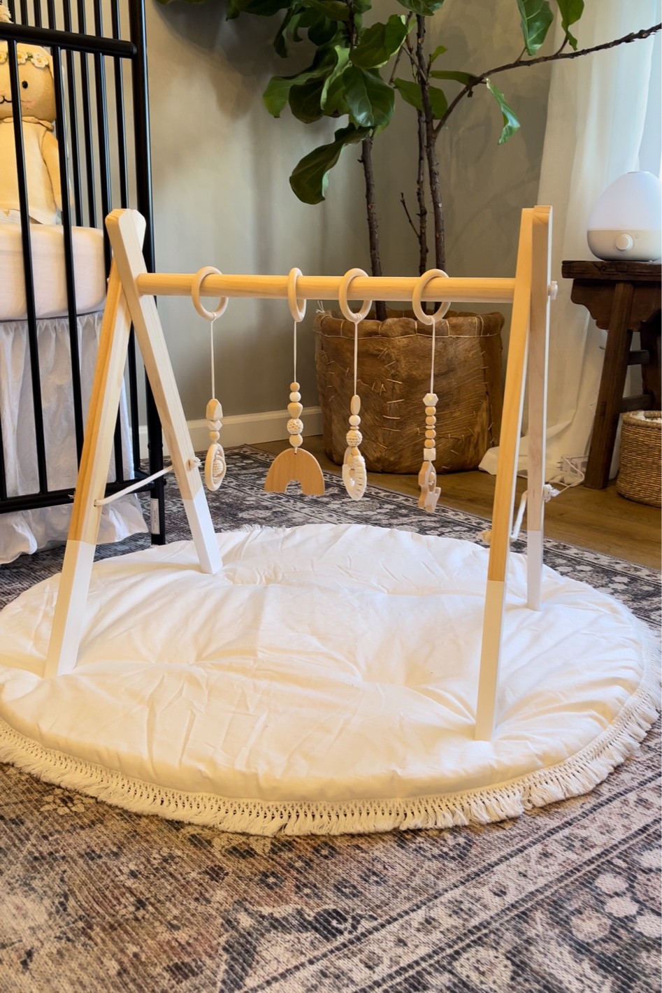 Neutral nursery. Amazon finds. Baby wooden play gym and fringe baby play mat from Amazon. Inexpensive baby finds  

#LTKbaby #LTKunder50 #LTKkids