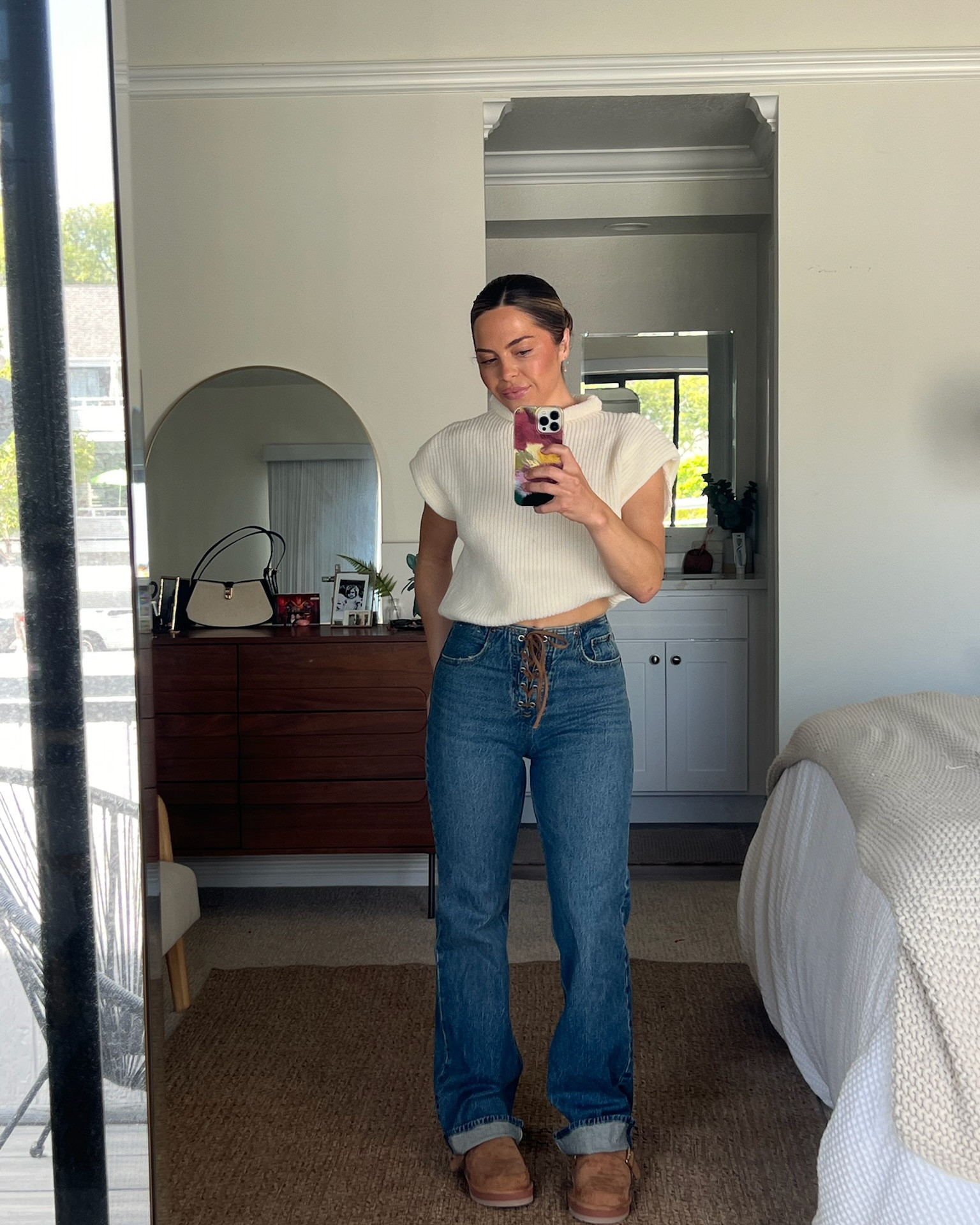 These lace up jeans from Abercrombie are PERFECT for fall! I styled them with this adorable white sleeveless sweater and my comfy clogs 🖤

#LTKStyleTip #LTKSeasonal #LTKFindsUnder100