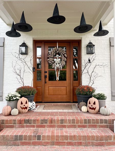 Halloween Porch Decor | Fall Porch Decor | Spooky Porch Decor | Witch Hat Decor | Ceramic Pumpkins | diy | jack o lantern | planters | outdoor sconce | wood door 

#LTKSeasonal #LTKhome #LTKHalloween