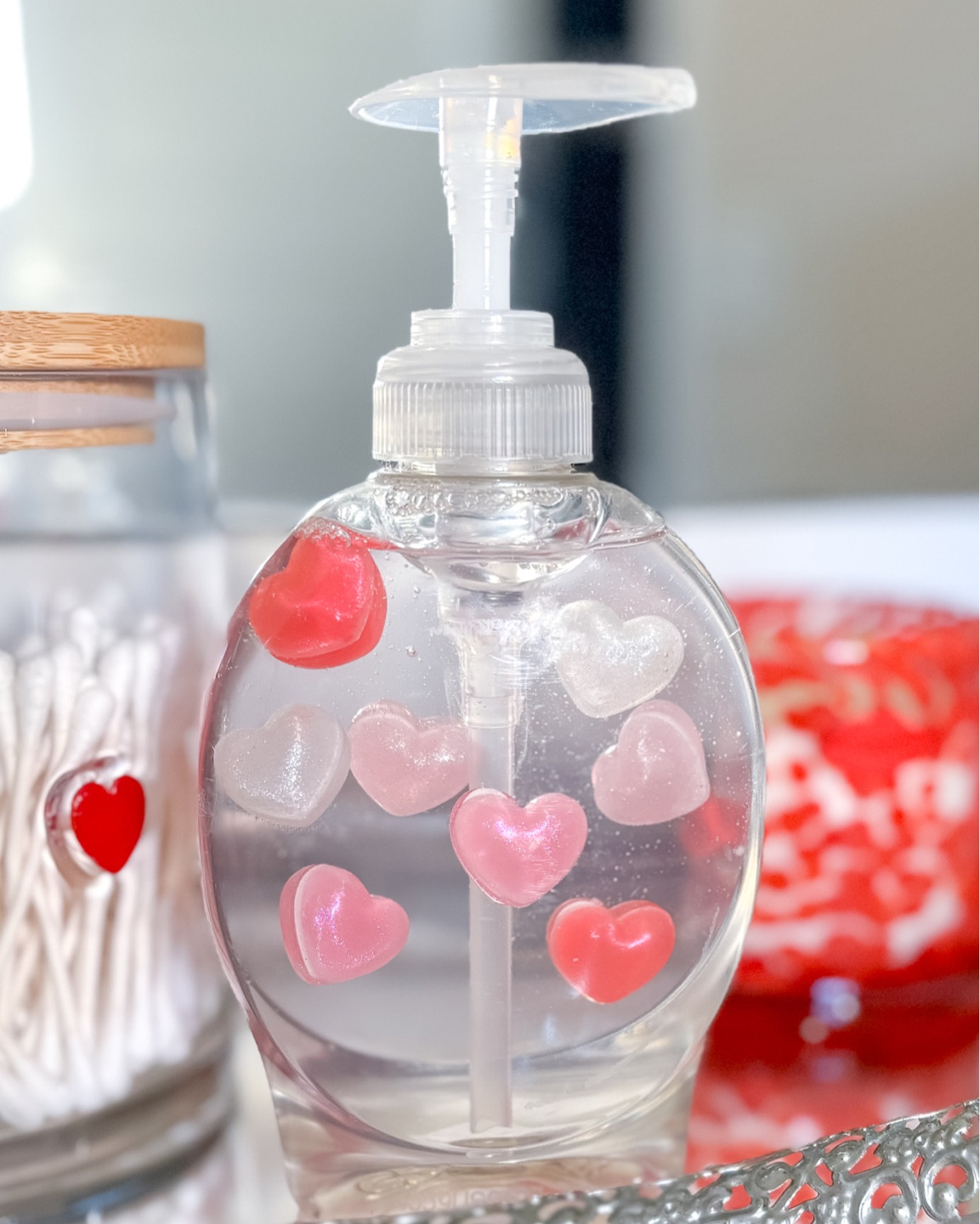 Add some Valentine fun to your kitchen & bathrooms! 
Grab some soap, take off the labels, and add some plastic hearts!
(The hearts I used can be found at Hobby Lobby, but they’re not online for me to link).

#LTKSeasonal #LTKHome