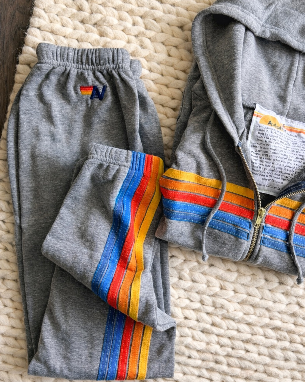 I loved the charcoal sweat set so much that this gray version was a zero-hesitation add to cart. The rainbow stripe detailing is so good in person, the zip up fits perfectly oversized with a sports bra or tee layered underneath, & the sweatpants are just the right weight. Two sets deep & I have zero regrets. Linked in my LTK!

aviator nation-sweat set-matching set-rainbow stripe-zip up hoodie-sweatpants-gray sweatsuit-casual style-athleisure-cozy outfit-weekend style-loungewear set-aviator nation hoodie-aviator nation sweatpants-california brand-made in california-stripe hoodie-comfortable sweatsuit-everyday outfit-mom style-casual chic-cozy set-sweat suit set-hoodie & sweatpants-relaxed fit-effortless style-neutral sweatsuit-gray hoodie-gray sweatpants-cool girl style-laid back outfit-luxury sweats​​​​​​​​​​​​​​​​

#LTKU #LTKdayinmylife #LTKActive