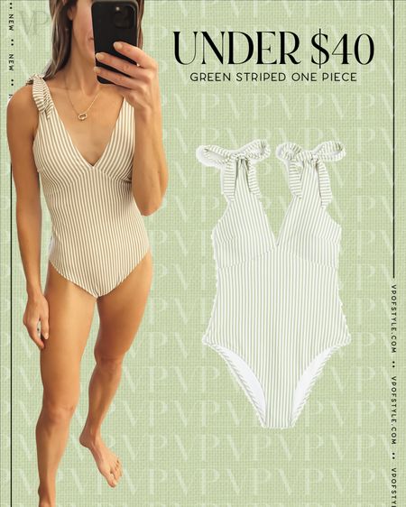 Green and white striped tie shoulder one piece swim suit under $40 and on sale today. A great one to Match your littles swim prints. Runs tts. Wearing size small. Moderate booty coverage and one you can run around and chase kids in. 
Vacation outfit 
Swimsuit
Beach outfit 
Pool outfit 

#LTKswim #LTKunder50 #LTKtravel