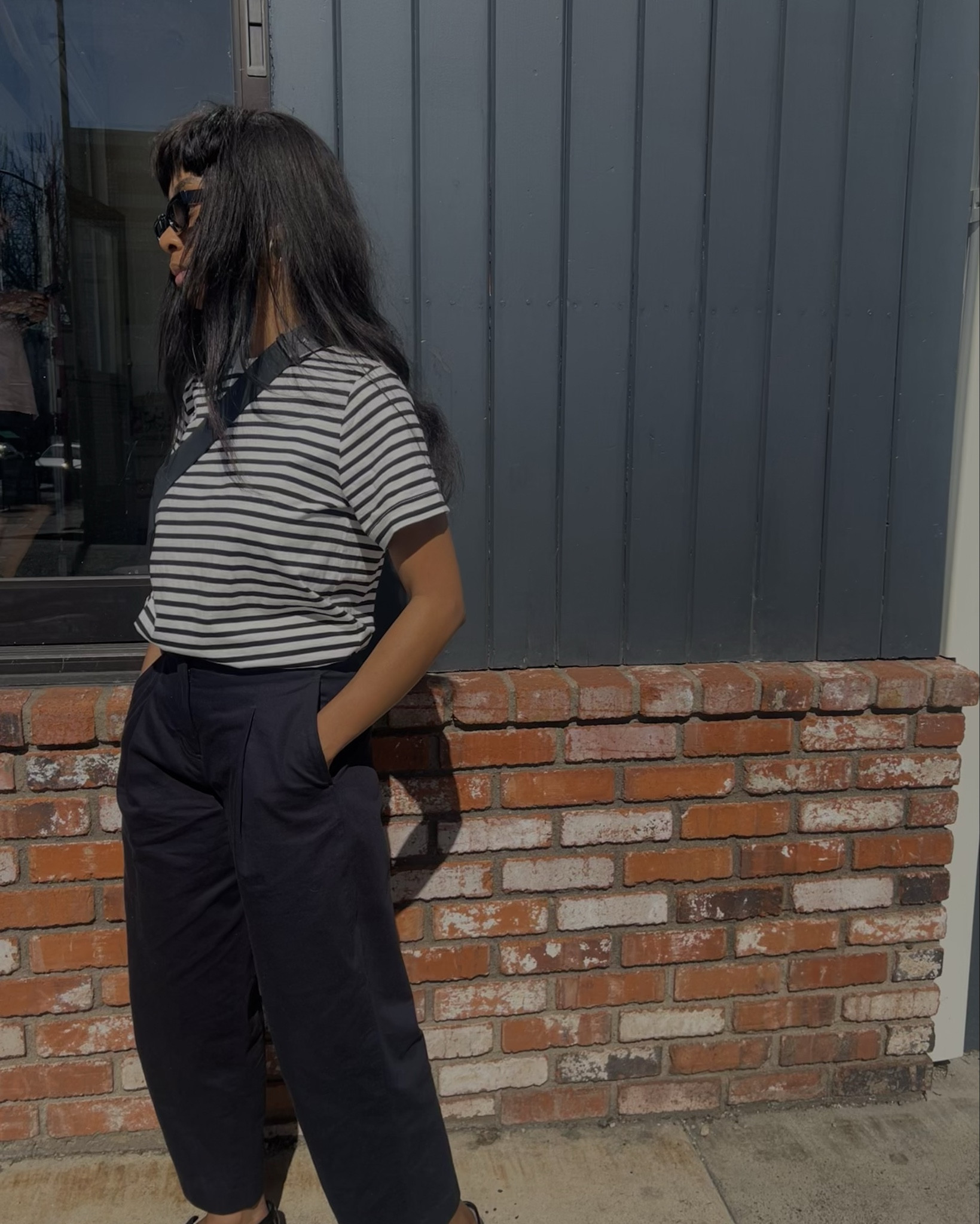black and white striped shirt, navy trousers, black loafers, black bag.

#LTKitbag #LTKstyletip #LTKworkwear