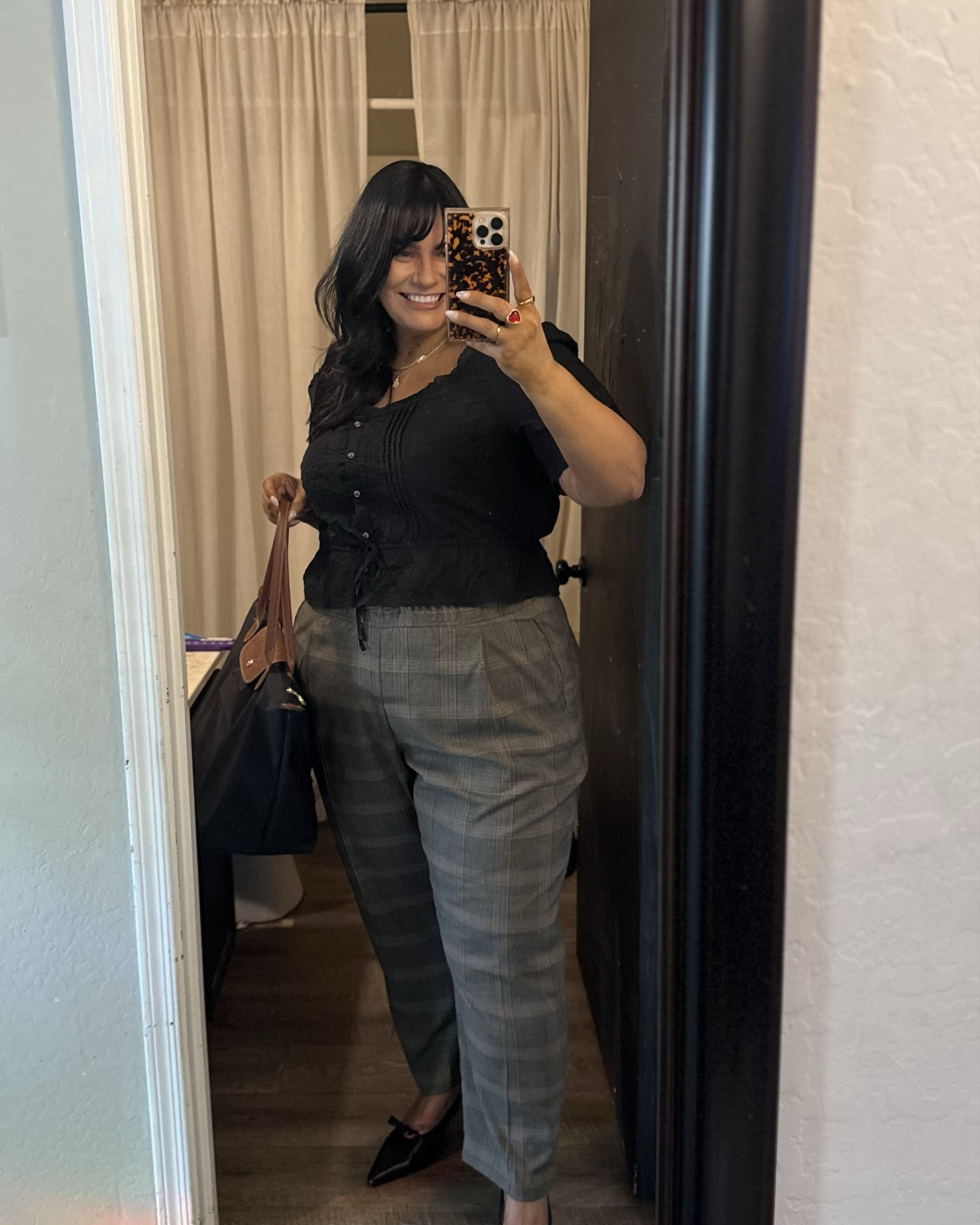 Comfortable business casual outfit for work. Shirt runs true to size and is very lightweight. Pants are generous sizing and have a stretch waist with tie. They are so comfortable and great if you’re in the middle of losing weight. I’m 5’6” size 16 and am wearing XL in both. Purse is a dupe for longchamp and excellent quality, none of my jewelry from Amazon tarnishes and I’ve had forever. Red heart ring from Torrid no problems with yet but I don’t wear it often. 

#LTKootd #LTKMidsize #LTKPlusSize