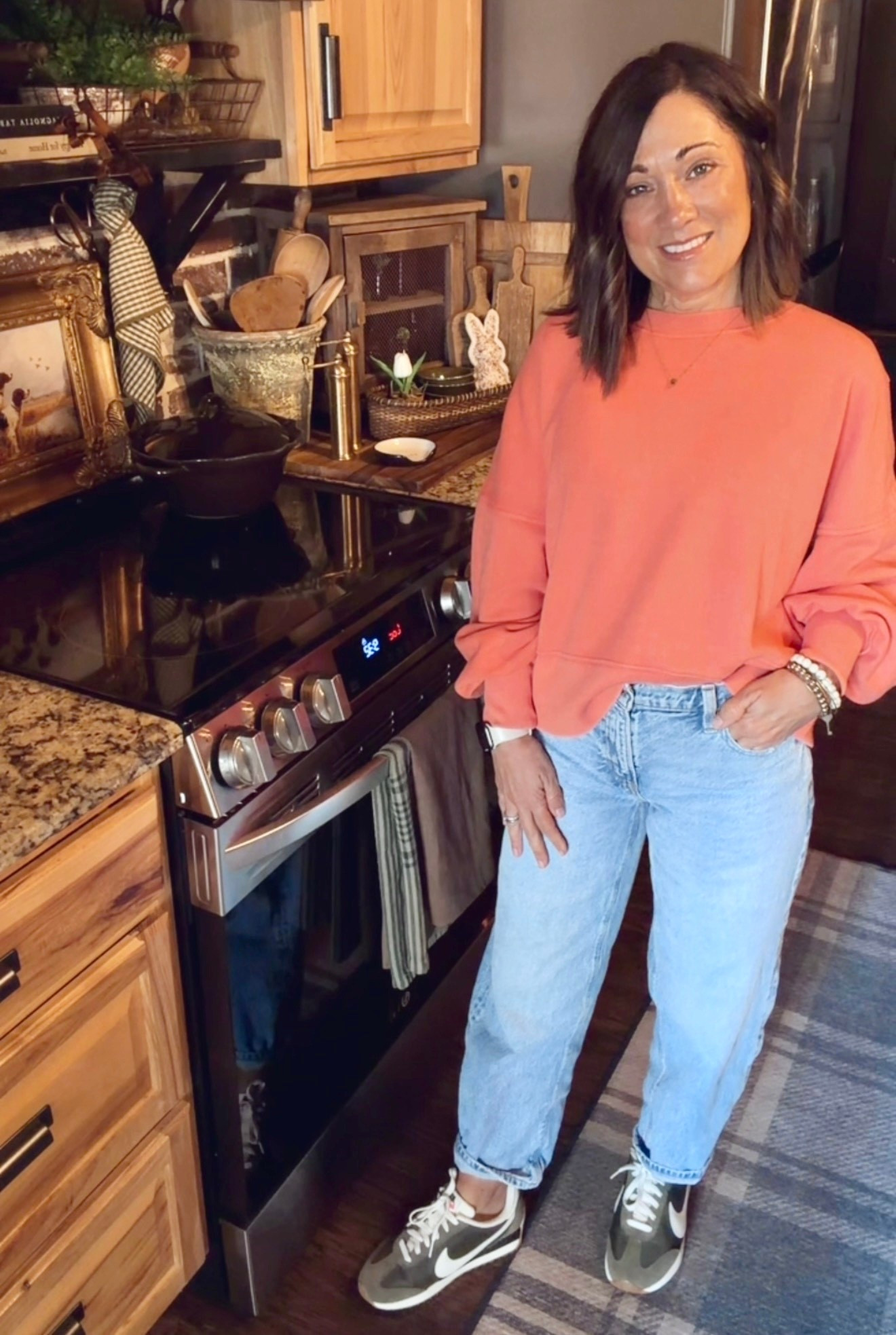 The cutest most cozy light weight sweatshirt and love the slightly barreled jeans and I can’t get enough of these olive green Nike shoes 

#LTKSaleAlert #LTKgrwm #LTKootd