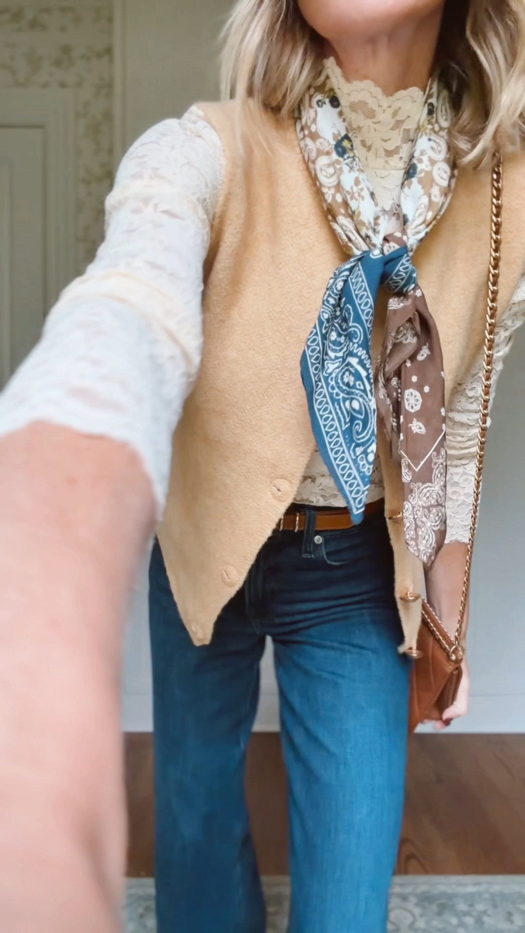 Small in lace top 
Small in gold vest 
2 in jeans 
Xs in brown vest 
0 in blazers