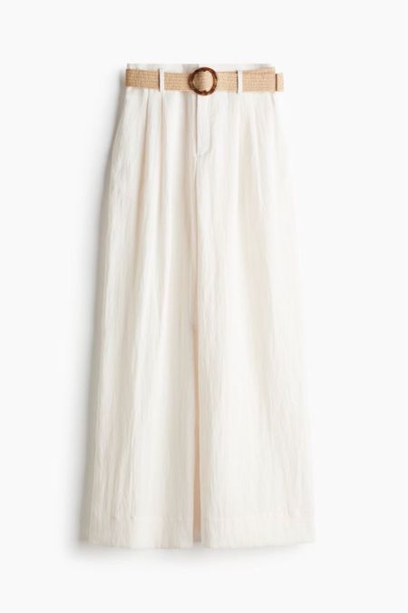 Ivory trousers with raffia belt 

#LTKSeasonal #LTKfindsunder50 #LTKstyletip
