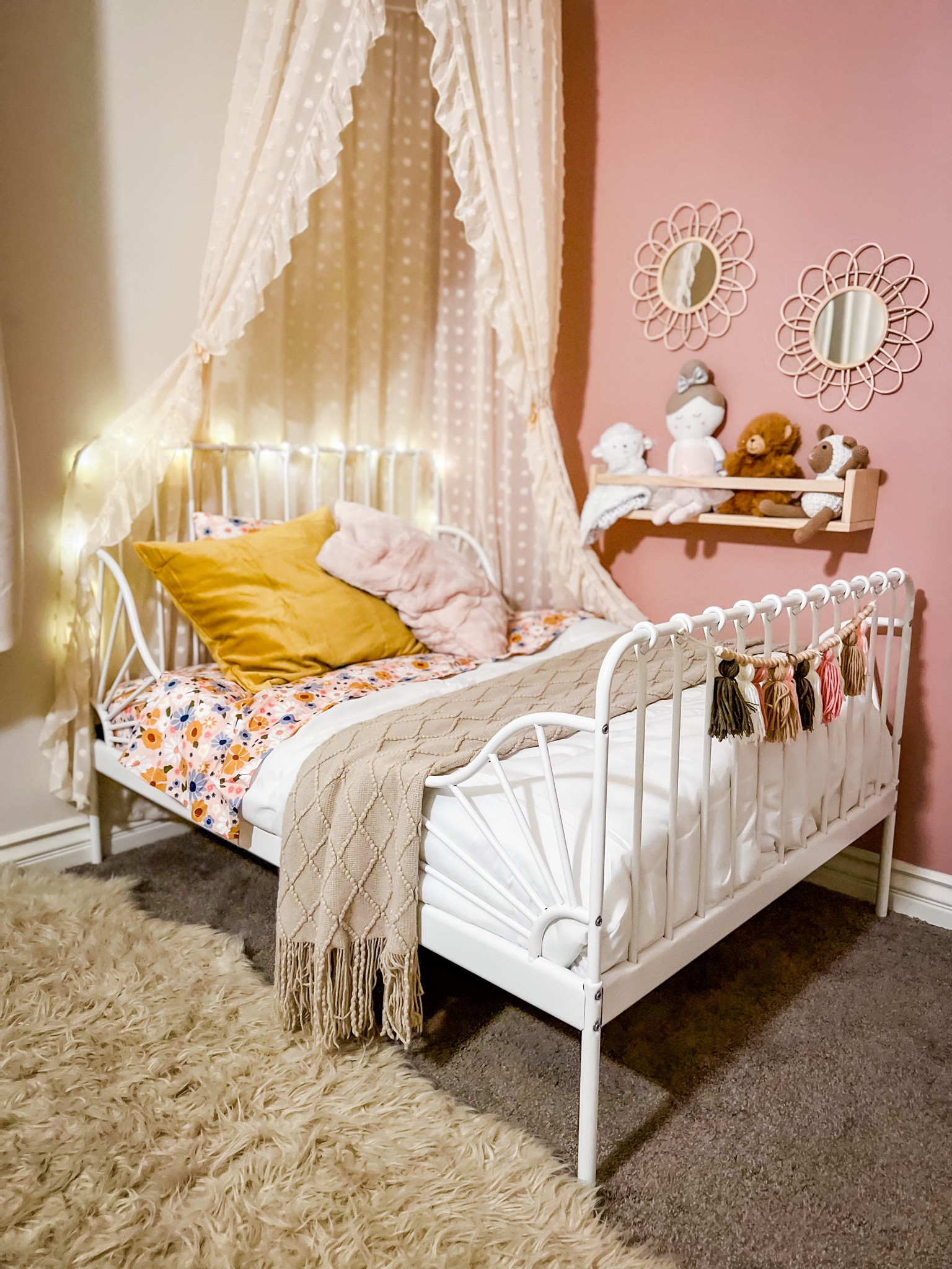 The cutest fairy toddler bed 🤗 Linking up the frame and mattress I use here - it’s a trifold that I removed a cushion from so it’s short and then will add to full length as I extend her bed for growth. 🌿

#LTKhome #LTKbaby #LTKkids