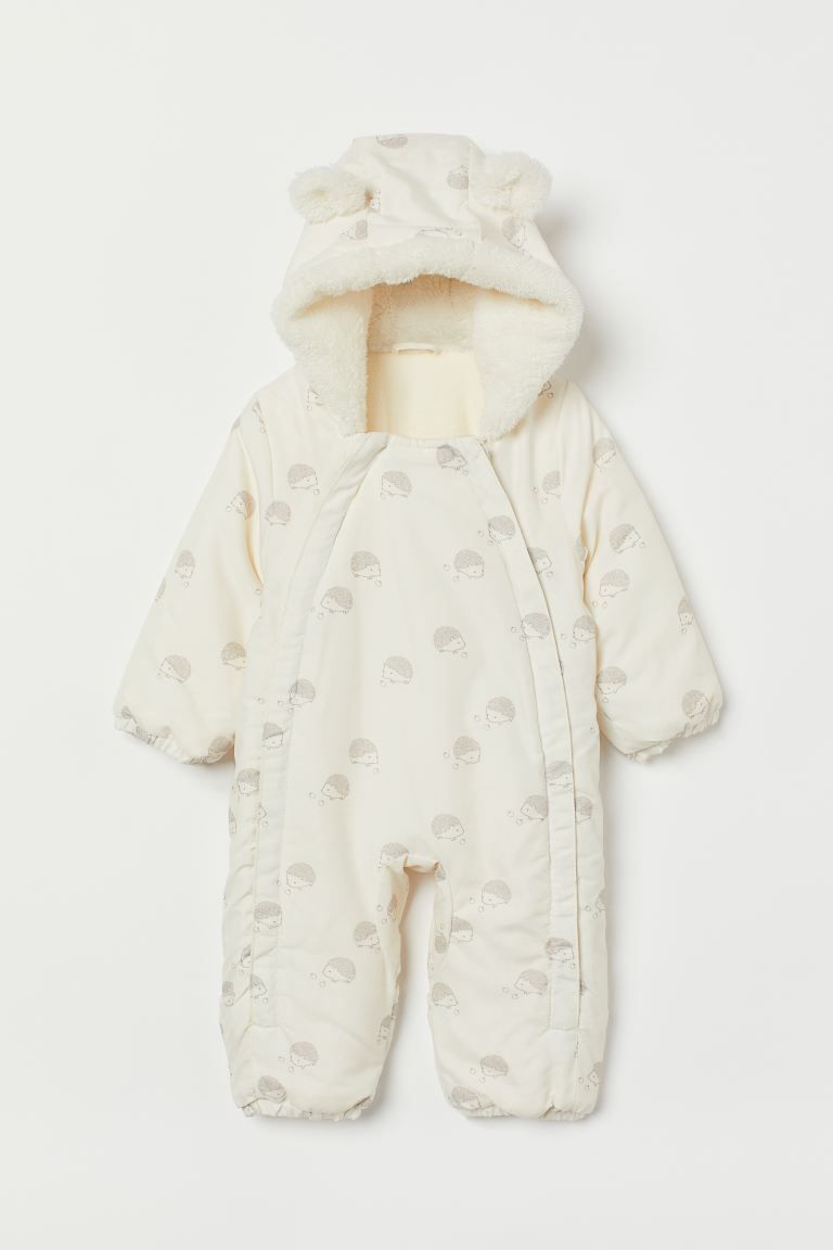 Padded baby bunting in lightly brushed, woven fabric with a printed pattern. Faux shearling-lined... | H&M (US + CA)