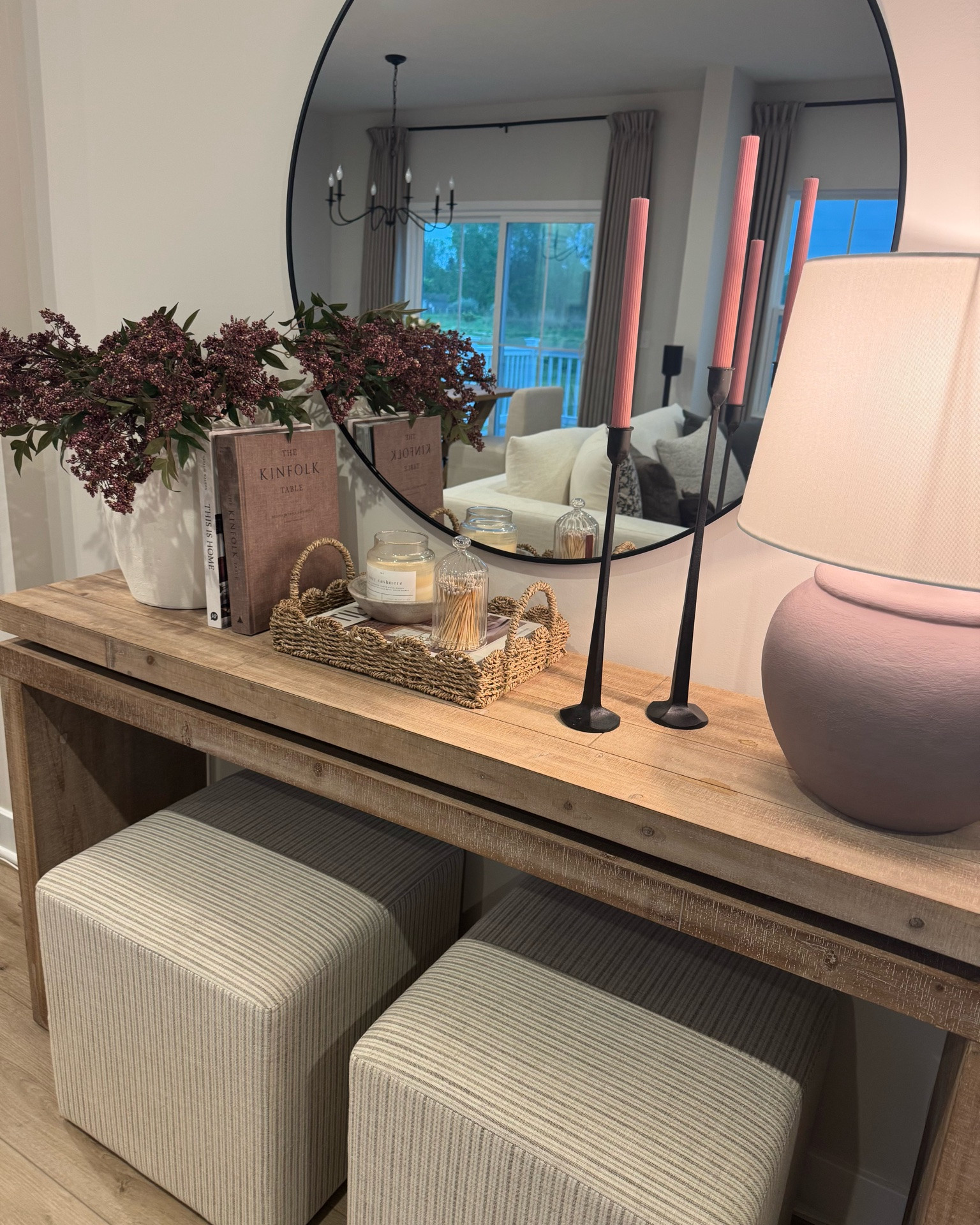 Console table, entryway, wood console, wayfair console, round mirror, berry stems, nandina stems, Afloral, luxenhome vase, urn vase, cream vase, candlestick holders, coffee table book, mauve candlesticks, scallop tray, basket, candle bowl