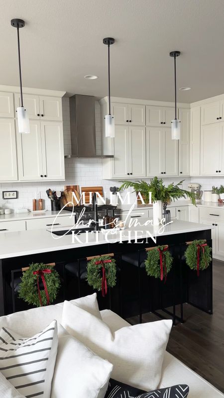 Minimal Christmas kitchen decor with wreaths on barstools, pine stems, and reindeer for the coffee bar!

#LTKHoliday #LTKSeasonal #LTKhome
