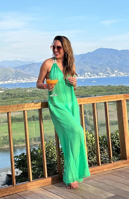 This sheer green jumpsuit is the perfect beach vacation coverup! It’s open in the back and so gorgeous, runs long. Beach vacation, vacation outfit, swim coverup, pool, swimsuit

#LTKswim #LTKover40