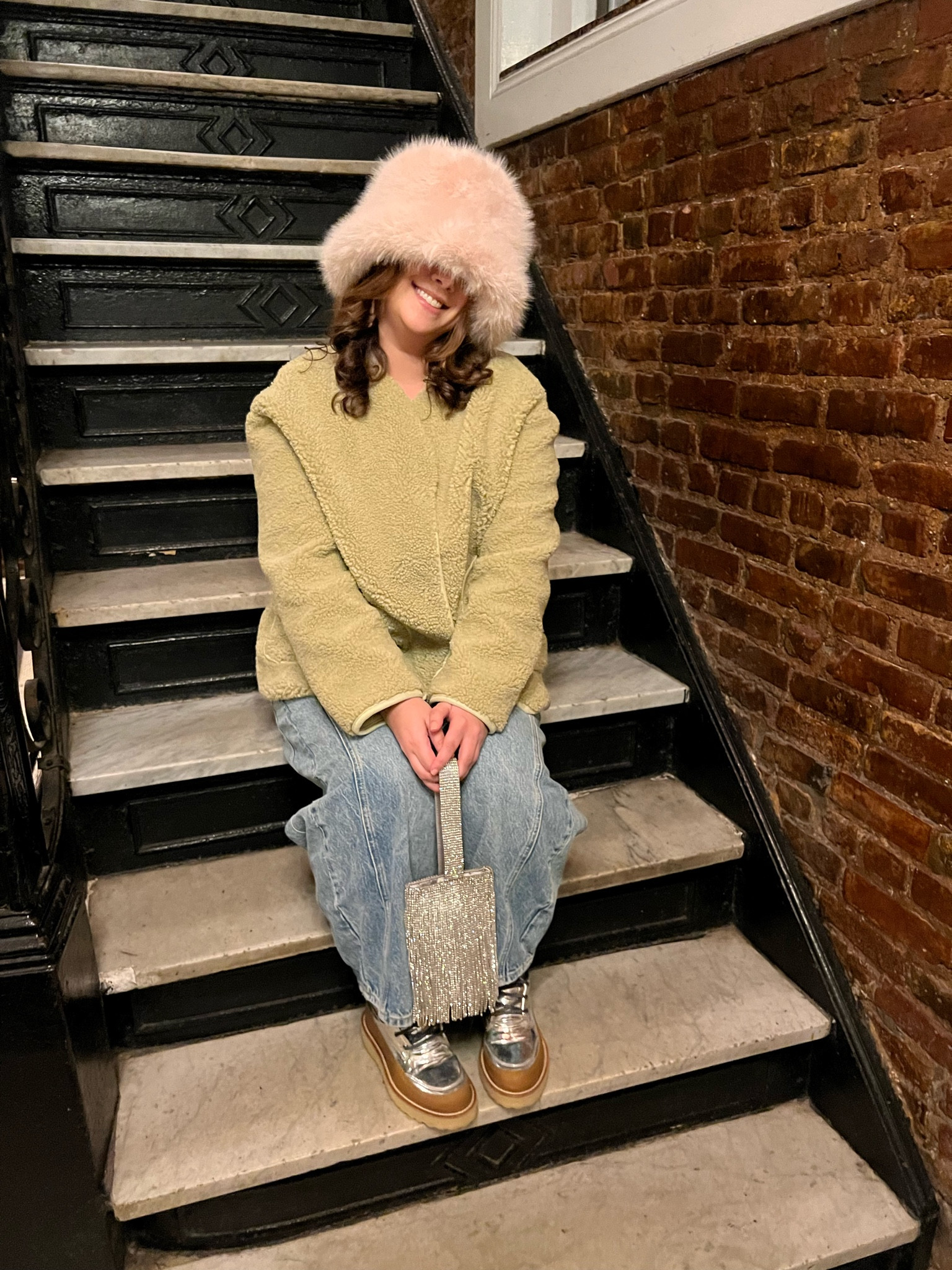 A fuzzy hat makes everything more fun 

#LTKitbag #LTKstyletip