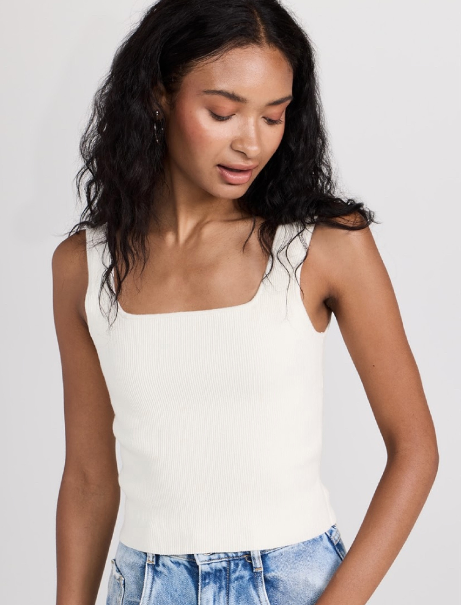 Sweater tank on sale in ivory and black under $70. 

#LTKSaleAlert #LTKFindsUnder100