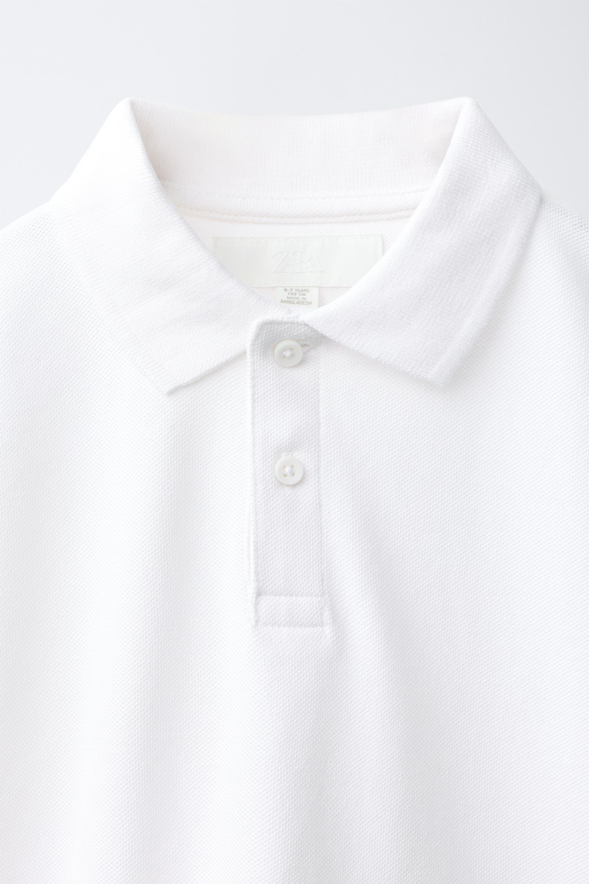 Long sleeve polo shirt with a polo collar. Button closure at the yoke. | Zara US