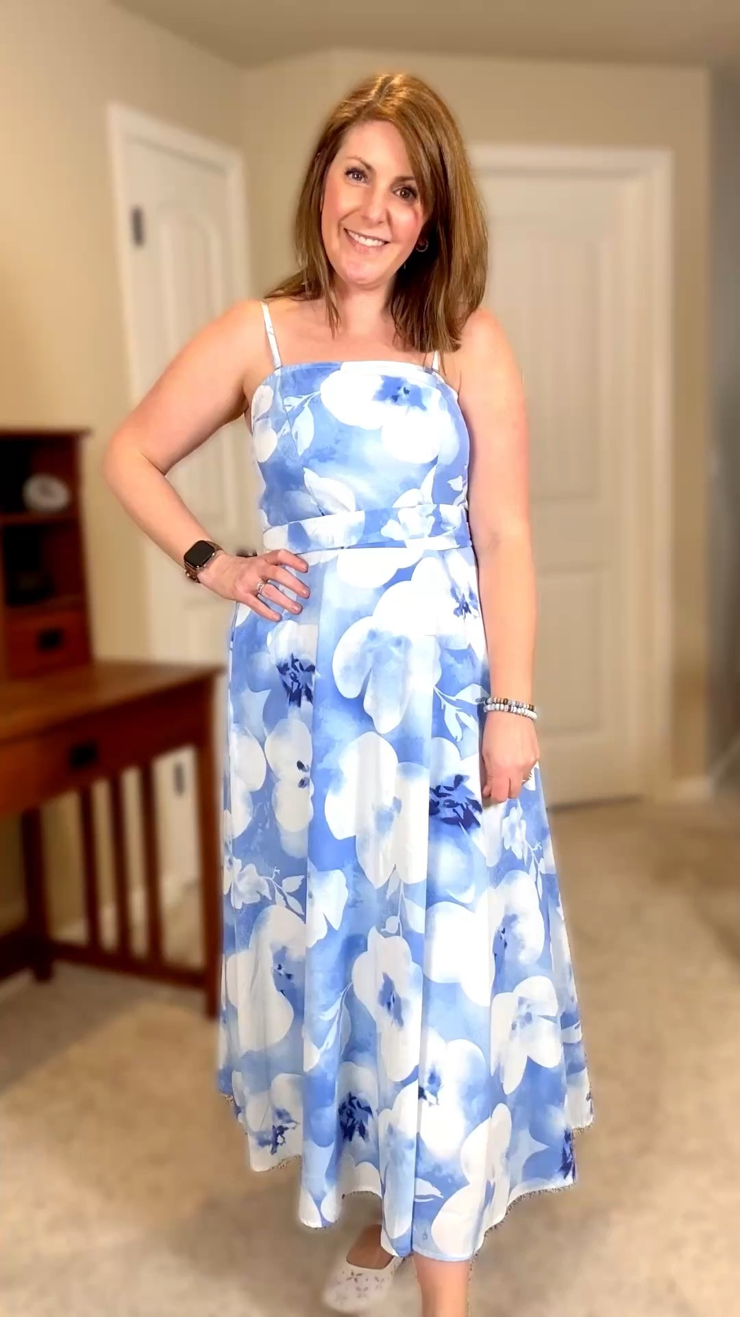 This blue and white floral dress from Zesica is such a flattering, comfortable option for spring and summer events. It has adjustable (and removable) straps, a smocked back for a flexible fit and a removable tie waist that can be styled a few ways. Fully lined and slightly longer, it feels elegant while still being easy to wear.