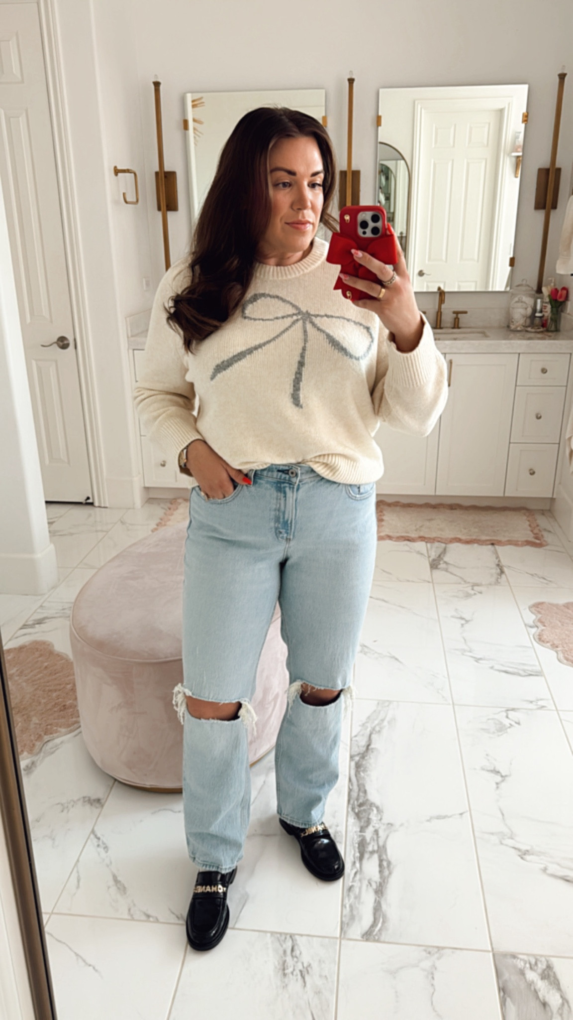 curvy casual Holiday outfit! wearing size large in bow sweater and size 31 curve in distressed light wash 90s denim 

#LTKMidsize #LTKFindsUnder100 #LTKHoliday