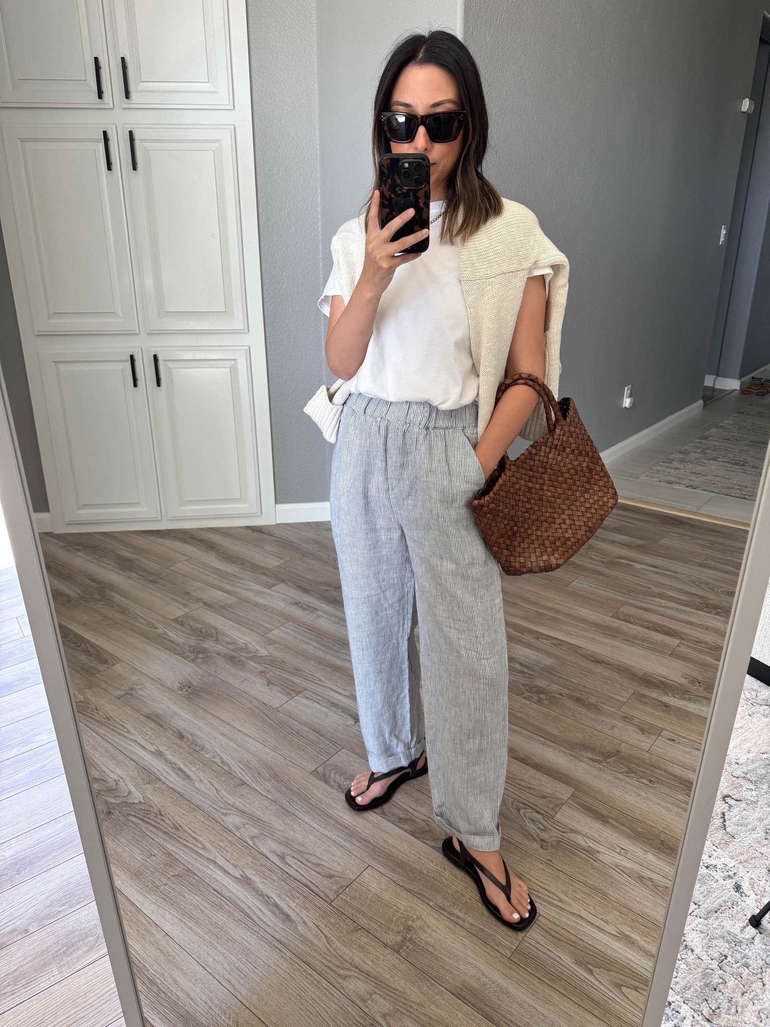Quince linen pants. Relaxed fit. Baggier leg style. Petite-friendly length. 

Everlane tee medium
Quince cardigan xs
Quince pants xs
Madewell sandals 5 
Little Liffner tote (old)
Celine sunglasses 

Summer outfits, petite style, sandals 

#LTKFindsUnder50 #LTKFindsUnder100 #LTKShoeCrush