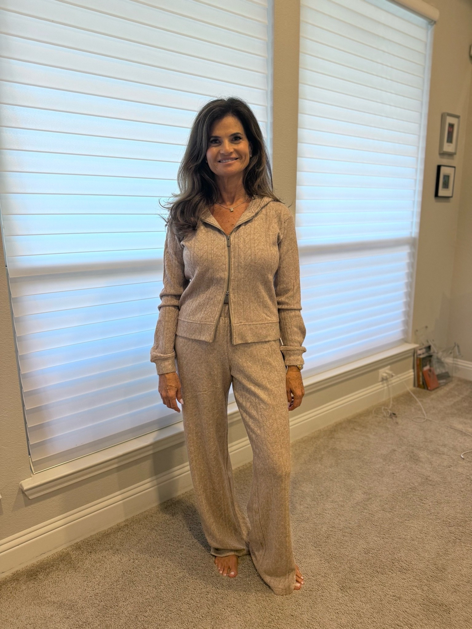 My mom’s stunning cable knit sweater pant and hoodie set. On sale with code FRIEND. She’s 5’5 and wearing xs

#LTKPetite #LTKOver40 #LTKSaleAlert