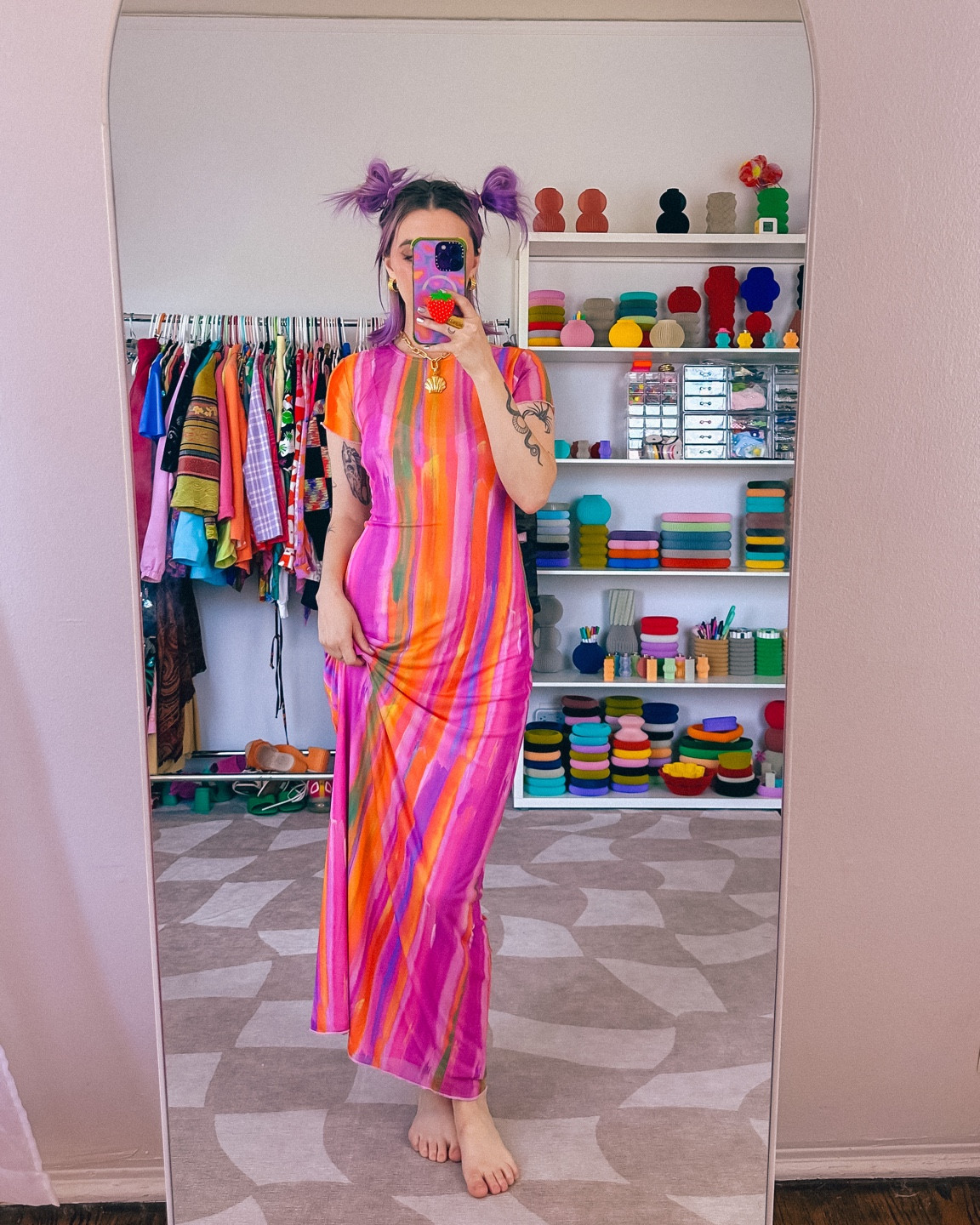 Champagne wears a multi-colored maxi dress with gold mermaid shell necklace. 

Colorful color maximalist maximalism pink orange beach brunch outfit style 

#LTKstyletip #LTKSale #LTKSeasonal