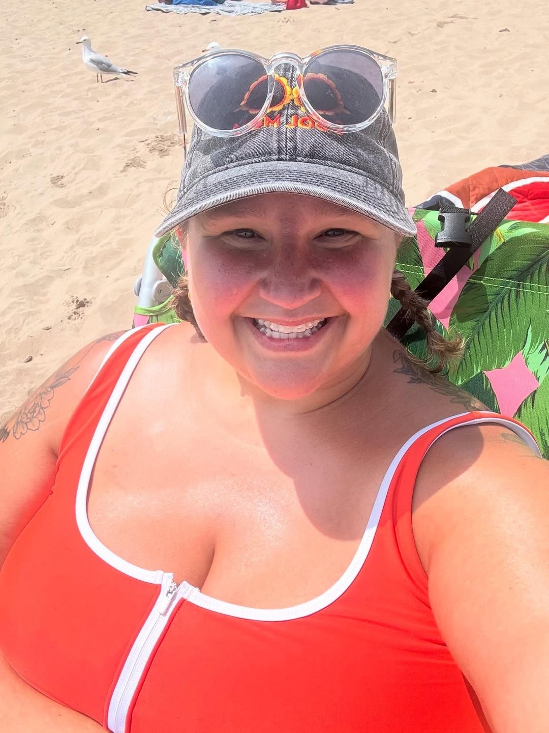 This. This is summer.

PB&Js and cookies at the water’s edge with your best friends. Swimming for hours, getting sand and seaweed in every single crevice, and taking a car nap on the way home while the AC tries to cool down sweaty, sunscreen-sticky bodies.

This is the summer I grew up with. I was raised on the shores of Lake Huron—and while this isn’t the same beach, we’re on Lake Michigan now (bigger, colder, west side of the state), the feeling is the same. Being in the sun, sand, and water takes me right back to childhood… except now I’m on the other side of it.

I’m the mom.
The snack packer.
The sunscreen applier.
The unofficial lifeguard.
The one counting heads as they pop up from the waves and yelling “stay where I can see you!” every 10 minutes.

And honestly? I’m living my best life.

Matching swimsuits with my best friend, planted in our matching Tommy Bahama chairs (thank you Mother’s Day hubbies), Dr Pepper in hand (supplied by the friend who actually remembers things), and teaching our kids how to build drip castles like it’s a sacred rite of summer.

If a perfect day exists—this was it. Even if I’m still pulling seaweed out of my hair on the drive home. Swimsuit is old Old Navy!

#LTKStyleTip #LTKSwim #LTKFindsUnder50