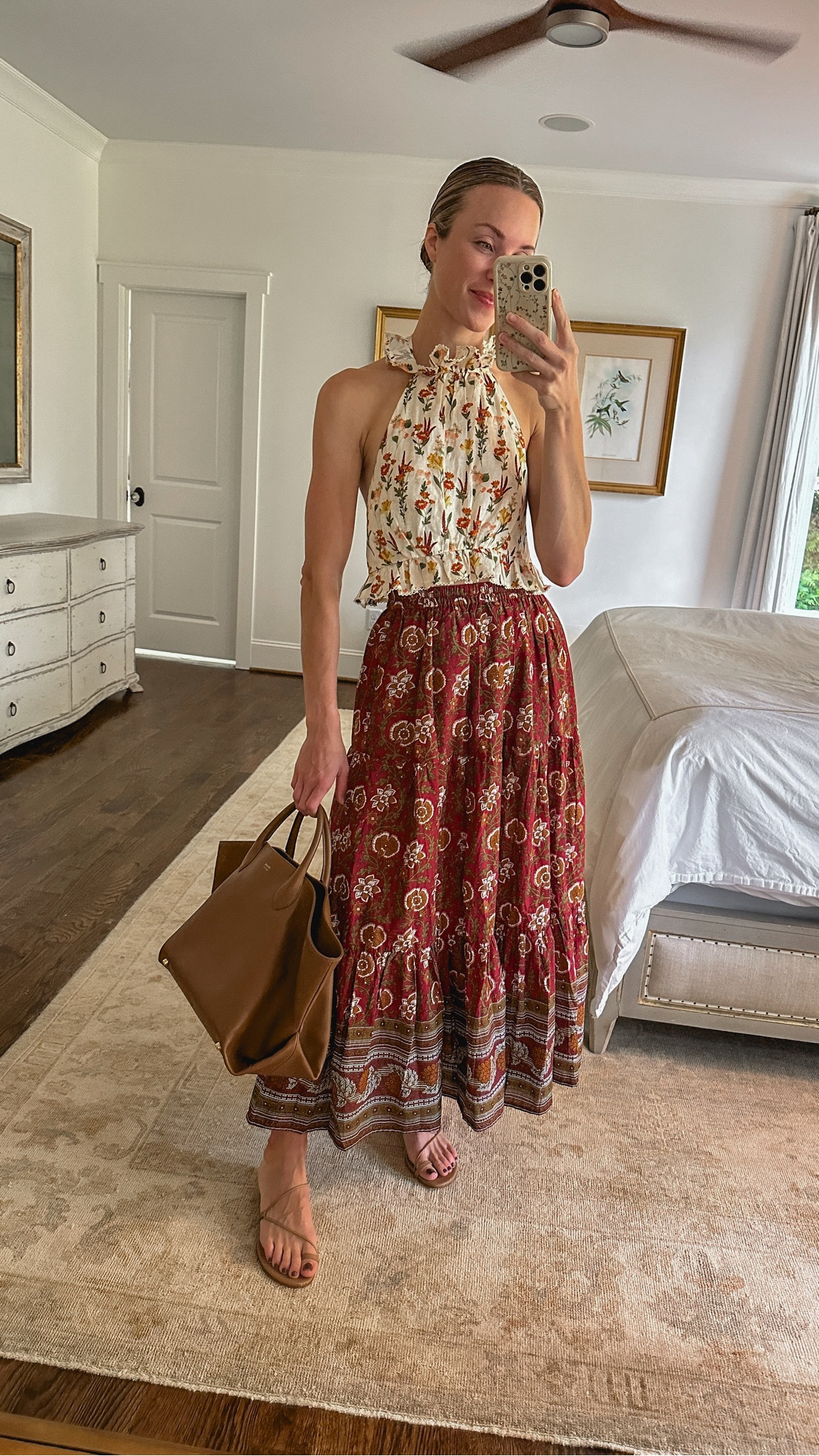A little floral mixing today! 🤎 This top is last season and on sale. Skirt is the Paola by MILLE and sold out in this color, but it’s available in other colorways and I love the fit + length (size XS shown). Similar summer to fall skirts you can wear with boots later also linked!

#transitionaloutfit #fallskirt #summertofalloutfit #brownskirt #browntote #brownleathertote #khaitetote 

#LTKSeasonal #LTKFindsUnder100 #LTKSaleAlert