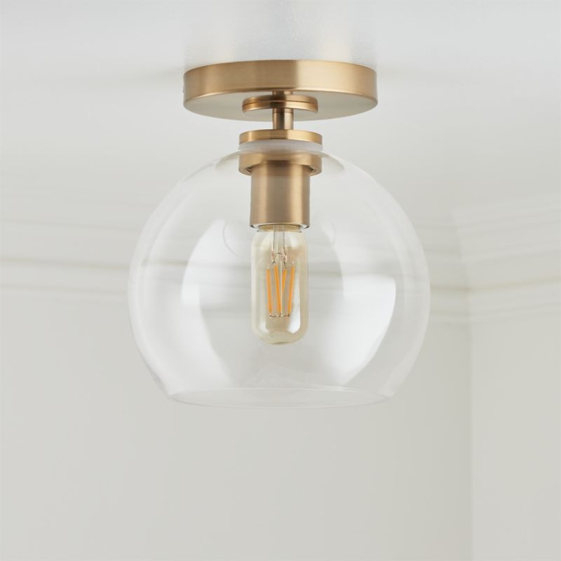 Arren Brass Flush Mount Light with Clear Round Shade | Crate and Barrel | Crate & Barrel