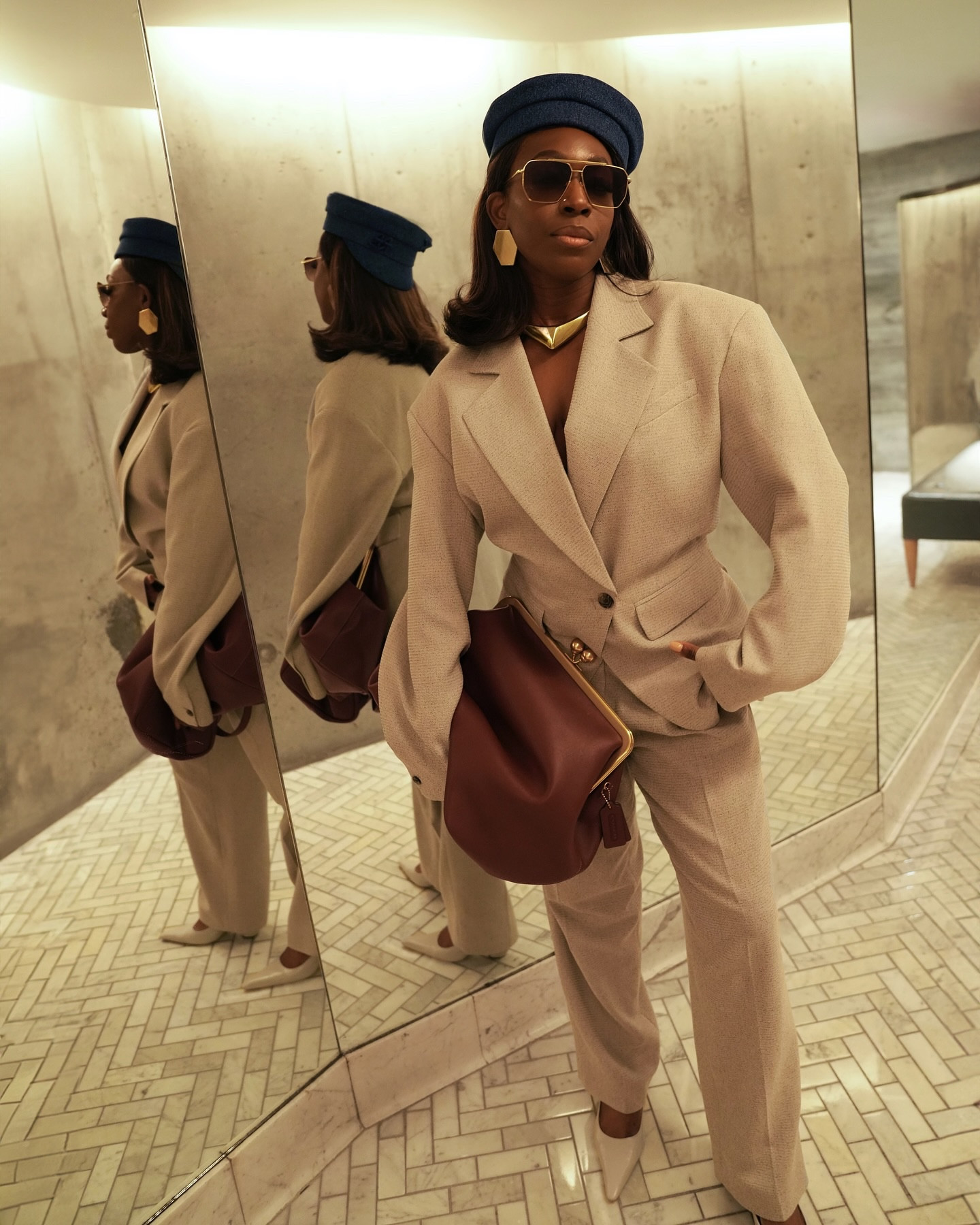 H&M said 80’s, so I delivered … my way 👌🏾 

Suit, shoes, & shades: @hm
Denim Hat: @ruslanbaginskiy
Kiss lock Bag: @coach 

If you missed the last two H&M Studio collections, don’t sleep on the next one: the designer collab with @magdabutrym drops April 24th ❤️

—
Fashion style • ootd • workwear • grey blazer • elevated • dc • nyc • denim hat • #ModernWorkwear #BlazerStyle #CoachBag #NYCFashion #DCStyle