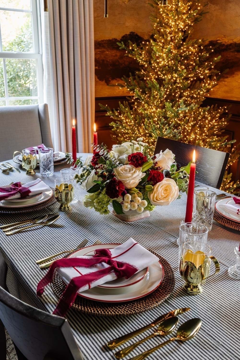 Create a holiday table that blends tradition and beauty. 

Layer rattan chargers, red rimmed dinnerware, crystal glassware, and a simple centerpiece with burgundy candles for an inviting, classic look. 

The mix of earthy textures and refined details captures a cozy yet elegant Christmas aesthetic, perfect for anyone who loves understated holiday charm. 

#christmastable #christmastablesetting #christmashomedecor #holidaytable #holidaytablesetting

#LTKHoliday