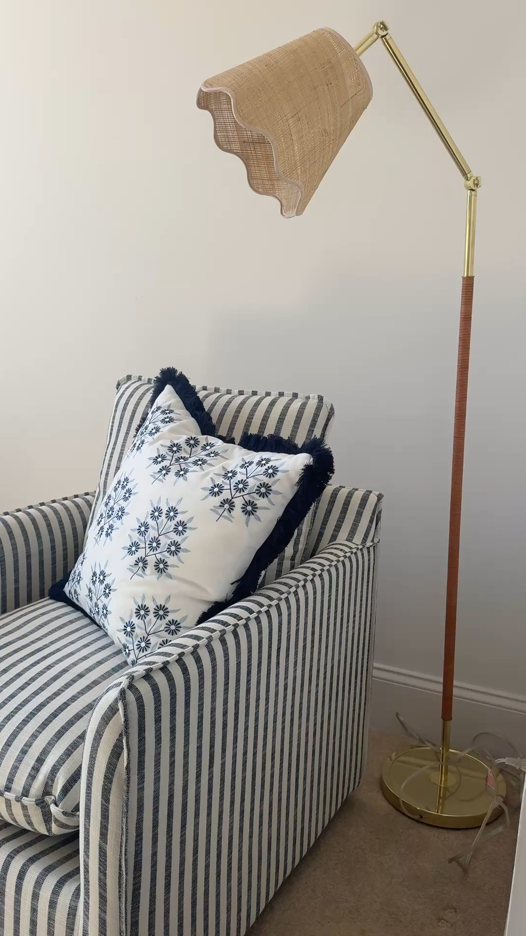 Casual coastal designer inspired sitting nook. Blue & white striped swivel under $250! 