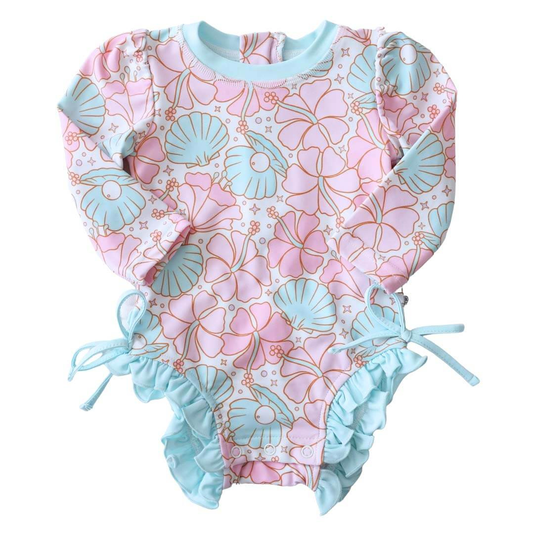 Long Sleeve Rash Guard With Ruffle Bottom | Ocean Pearl | Caden Lane
